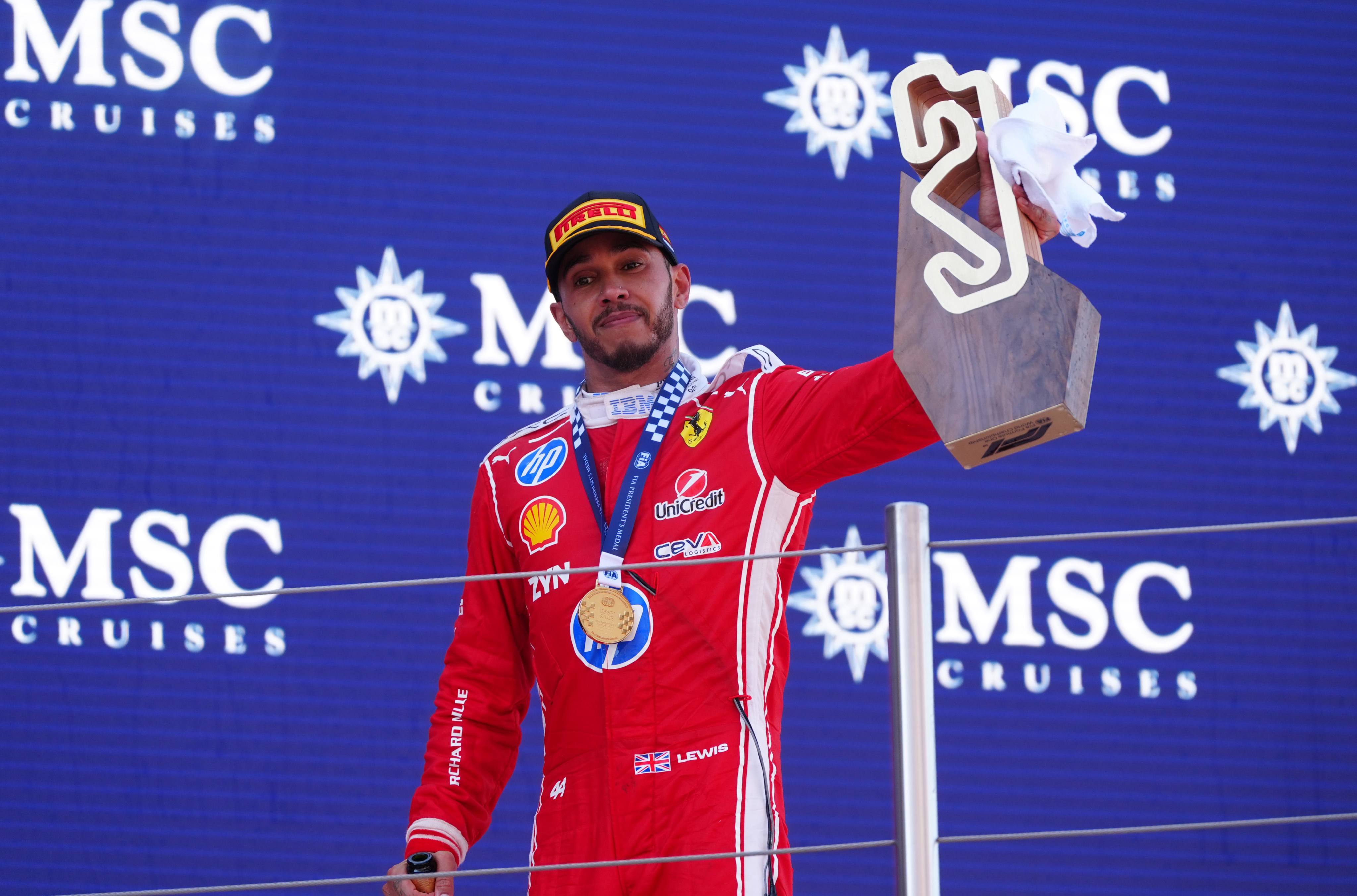 Ferrari driver Lewis Hamilton looked “very happy” on the podium after winning the Barcelona-Catalunya Grand Prix on Sunday, Toto Wolff says. Photo: dpa