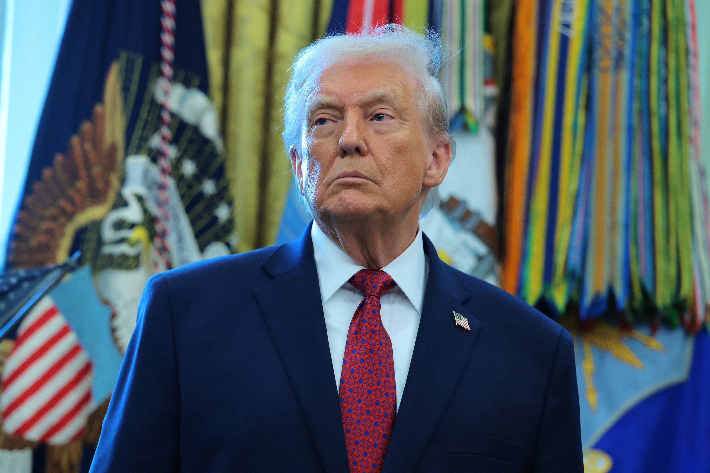 U.S. President Donald Trump listens during a ceremony for the presentation of the Mexican Border Defense Medal in the Oval Office of the White House on Monday, Dec. 15, 2025, in Washington, D.C. In June 2026, Trump said he plans to appoint James McDonald as U.S. Attorney for the Southern District of New York, the federal prosecutor whose office handles many of the most high-profile cases involving Wall Street. (Anna Moneymaker/Getty Images/TNS)