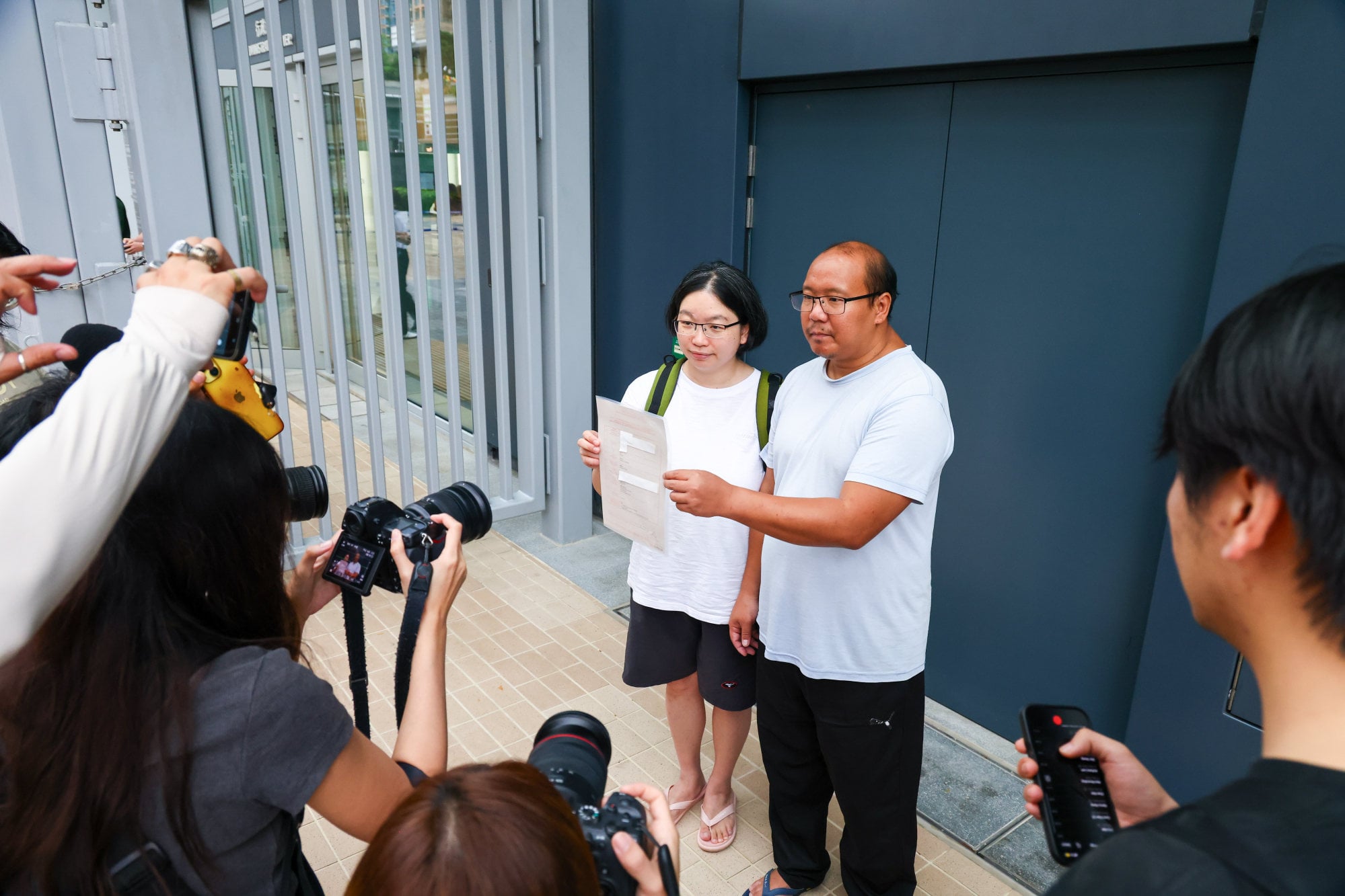Kwan Pui-sin and Tsang Wai-bong display their son Danny’s birth certificate, which they obtained from the Immigration Department after finally agreeing to a DNA test. Photo: Dickson Lee Kwan Pui-sin and Tsang Wai-bong display their son Danny’s birth certificate, which they obtained from the Immigration Department after finally agreeing to a DNA test. Photo: Dickson Lee