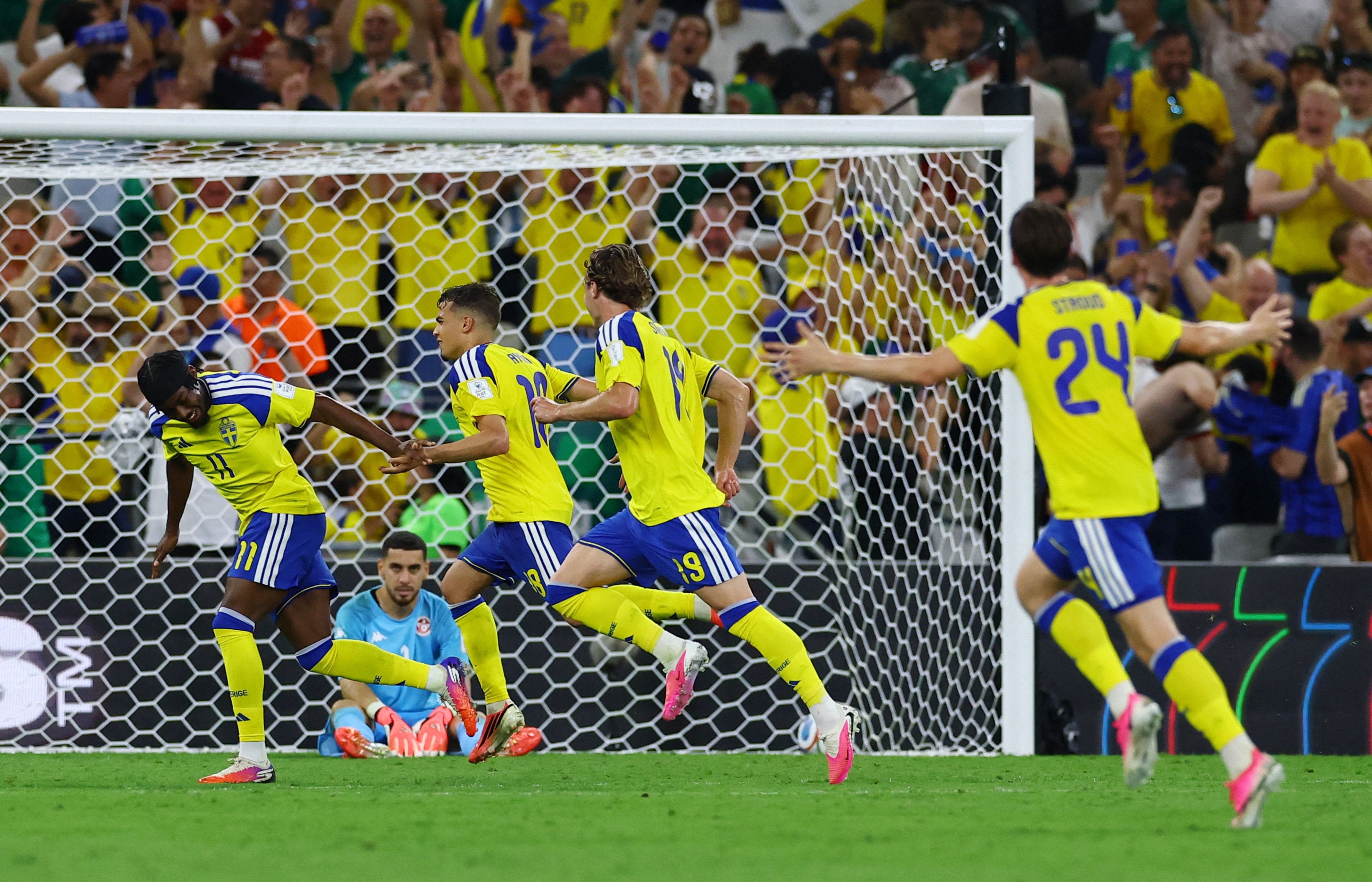 Sweden’s Yasin Ayari (second left) embarks on a celebratory run after his second goal. Photo: Reuters