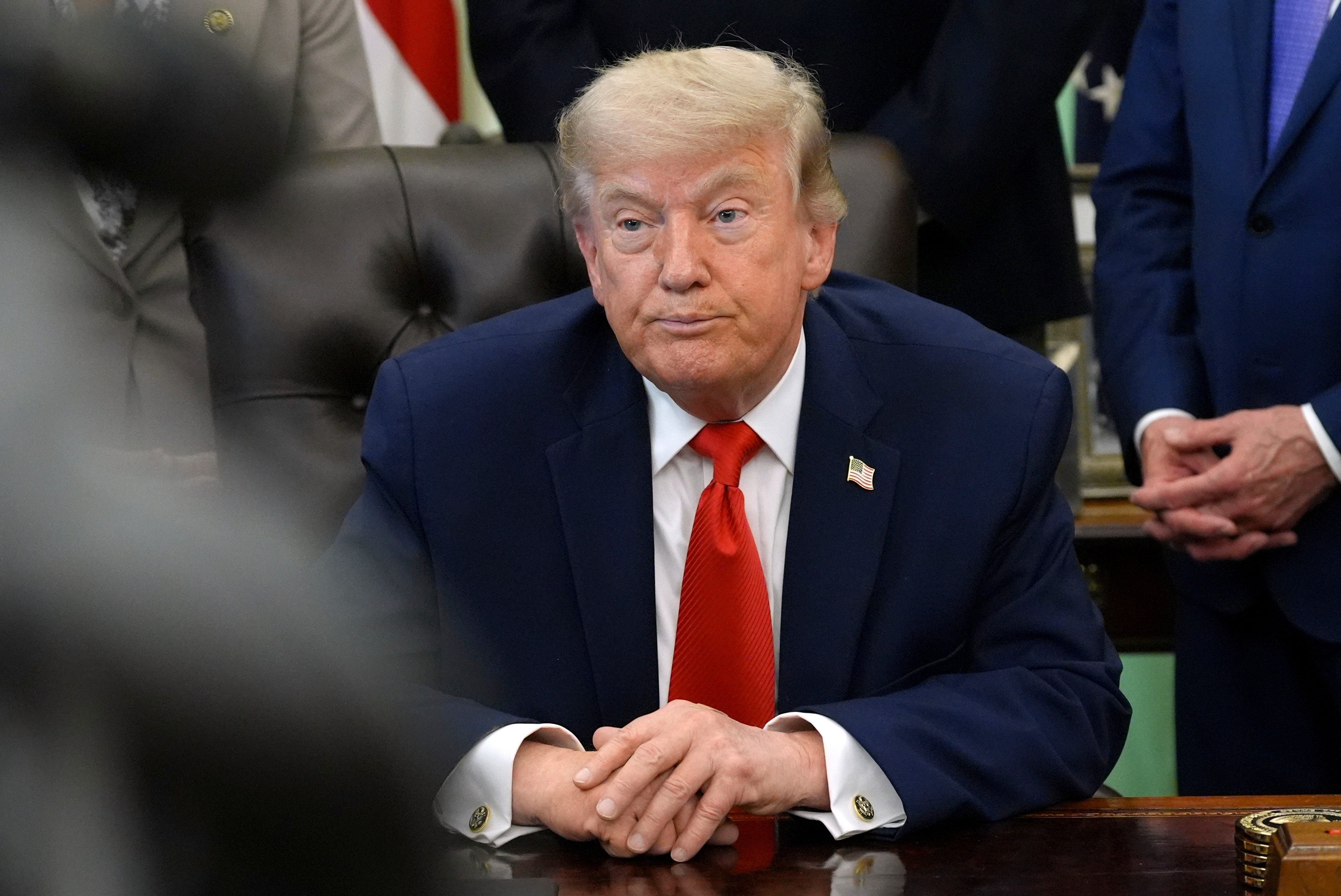 US President Donald Trump is seen in the Oval Office of the White House on Thursday. Photo: AP