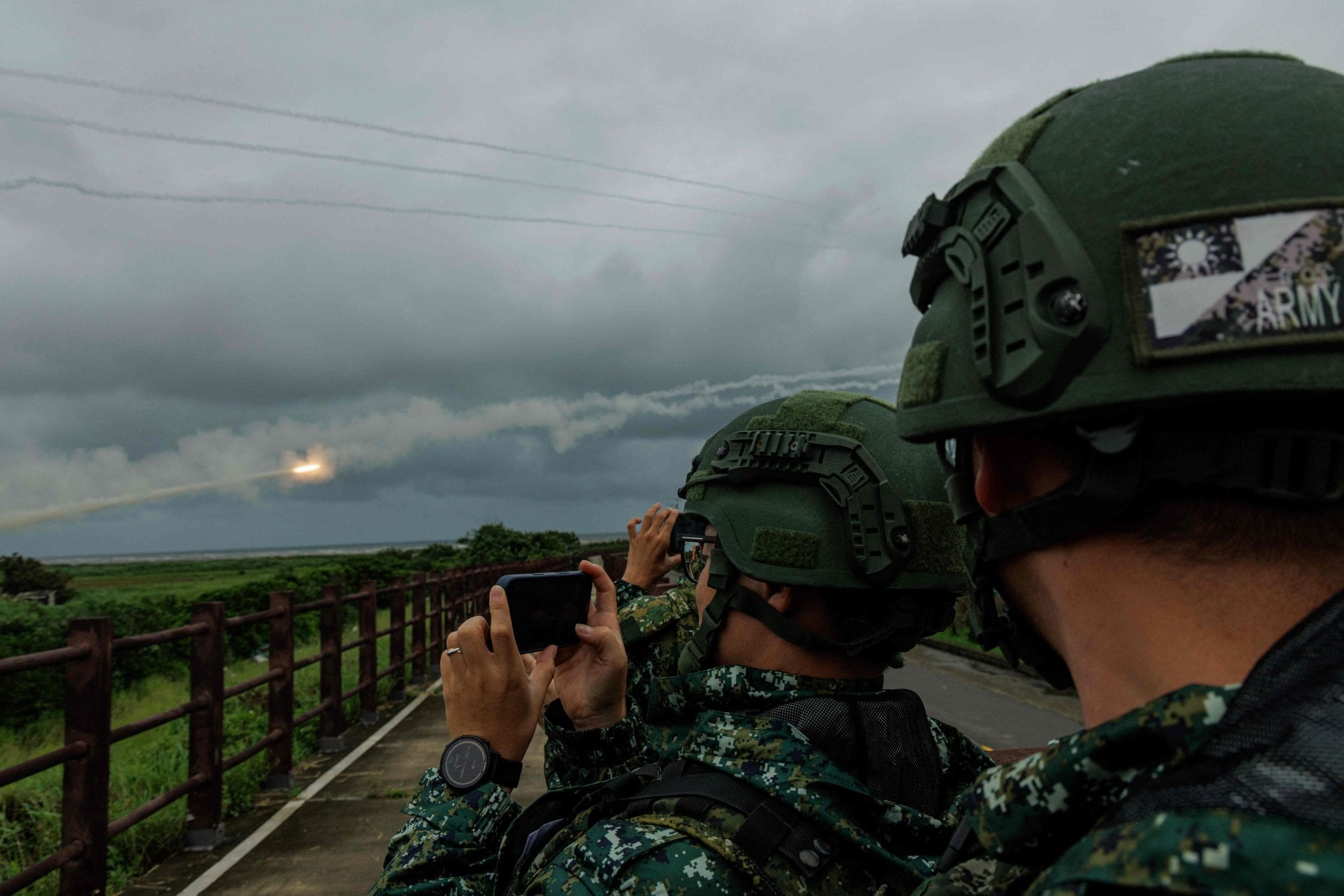 Soldiers watch the launch of a Himars missile. Photo: AFP Soldiers watch the launch of a Himars missile. Photo: AFP