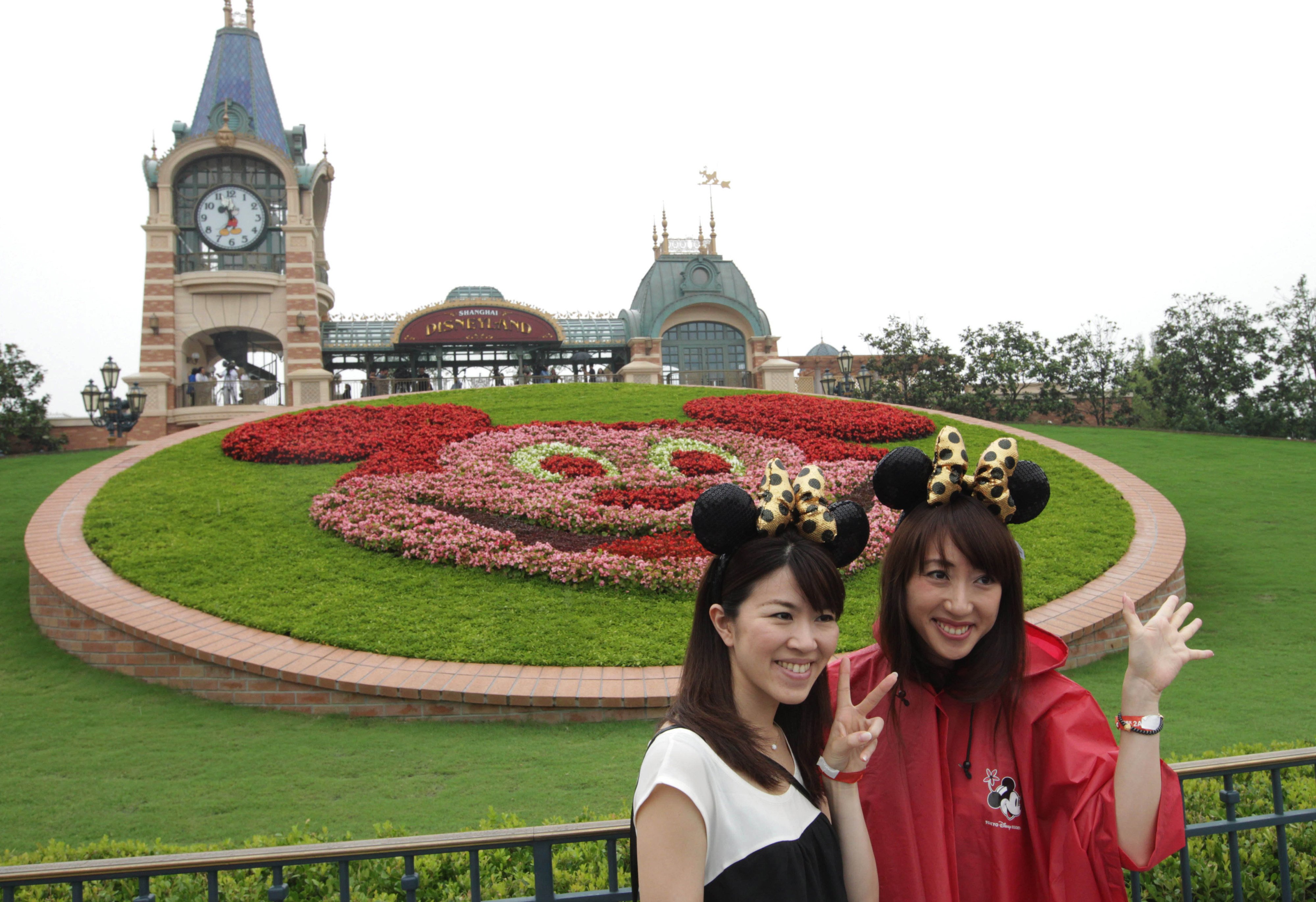 Tourists from Japan are pictured at Shanghai’s Disneyland theme park on its opening day on June 16, 2016. Photo: Simon Song