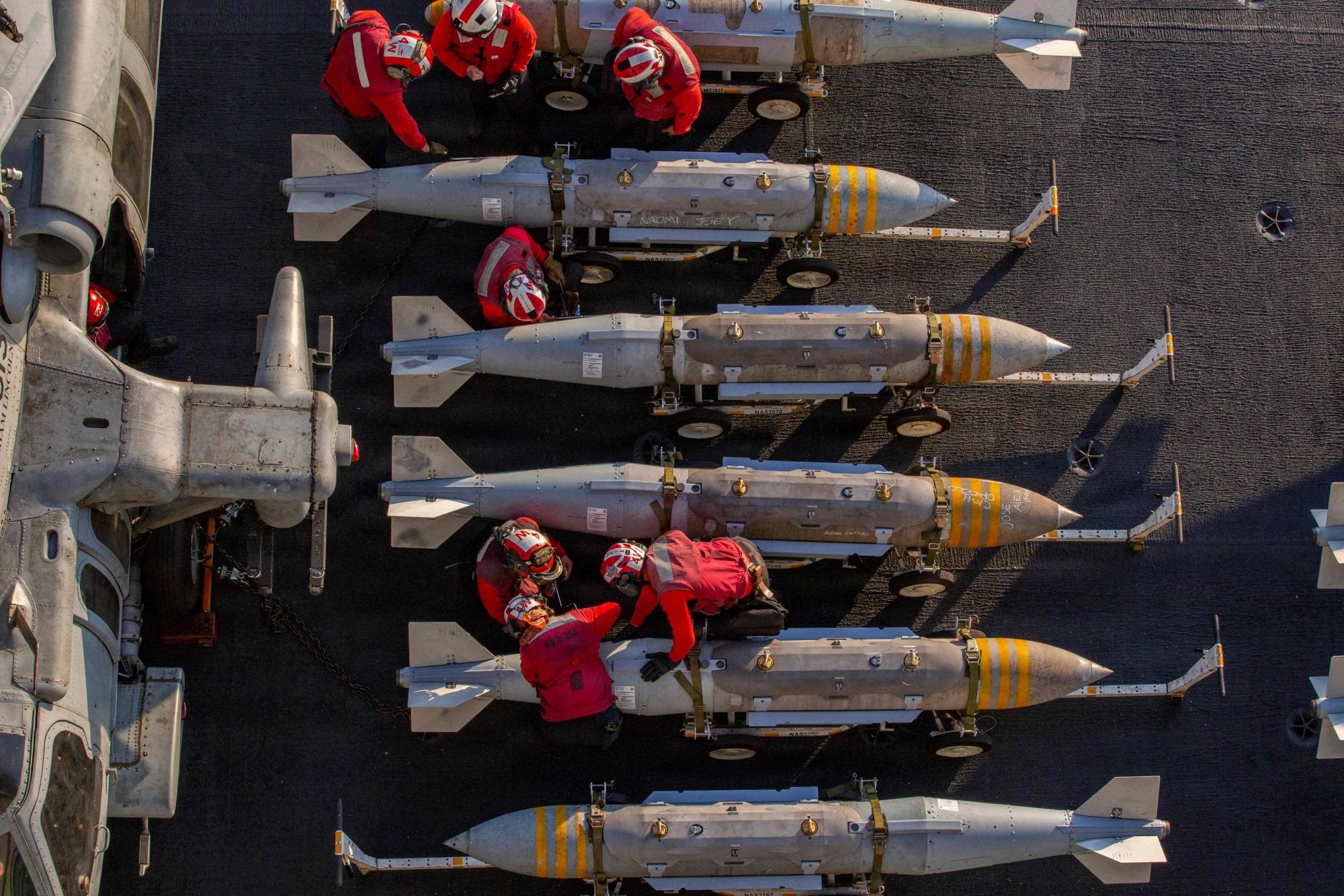 Ordnance on the flight deck of the USS Abraham Lincoln. Photo: US Navy via AFP Ordnance on the flight deck of the USS Abraham Lincoln. Photo: US Navy via AFP