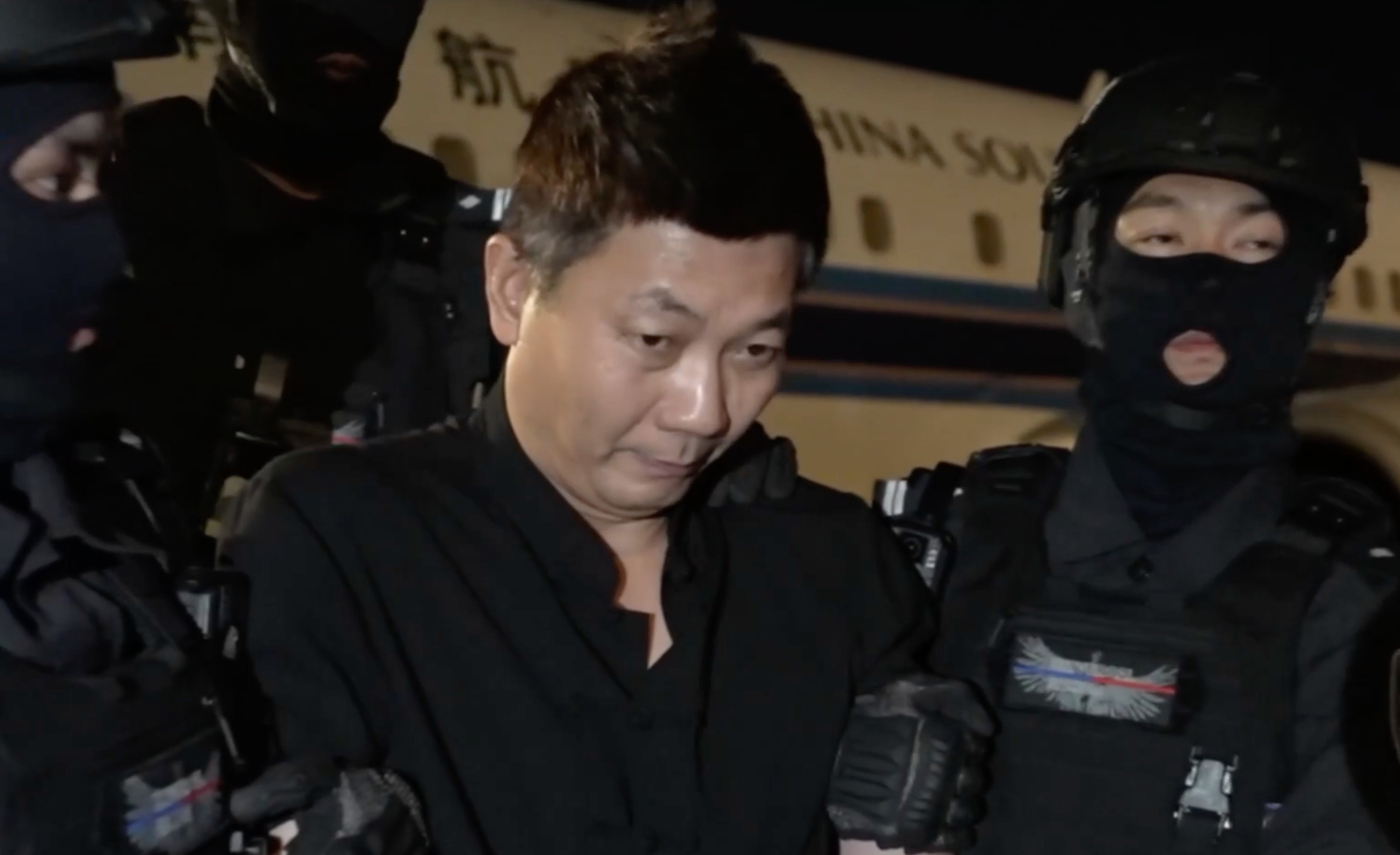 Liu Ren (centre) is a central figure of a criminal group masterminded by Chinese businessman Chen Zhi. Photo: CCTV