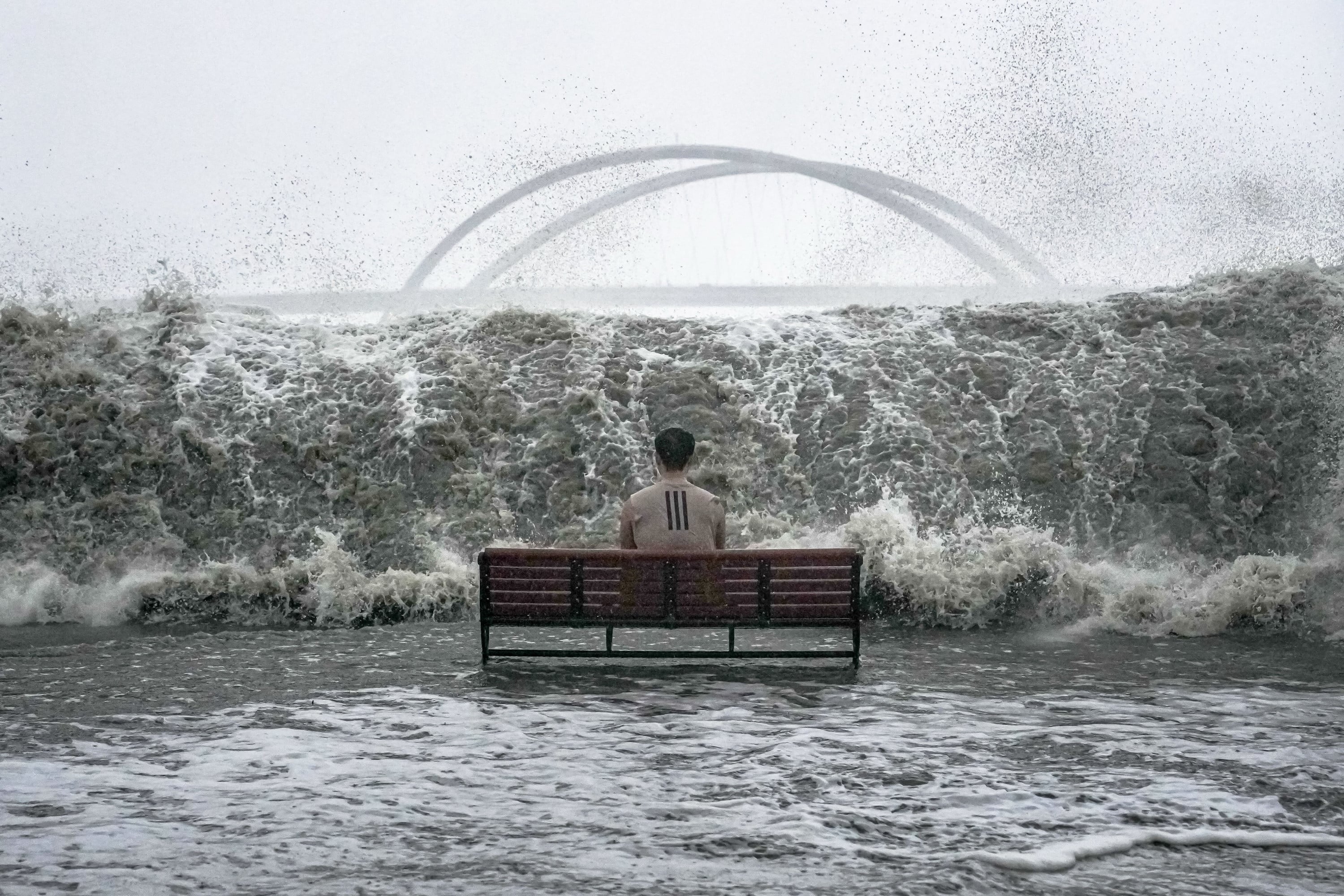 A man sits on a bench on the Tseung Kwan O Promenade as Super Typhoon Ragasa approaches Hong Kong in September last year. Photo: Elson Li