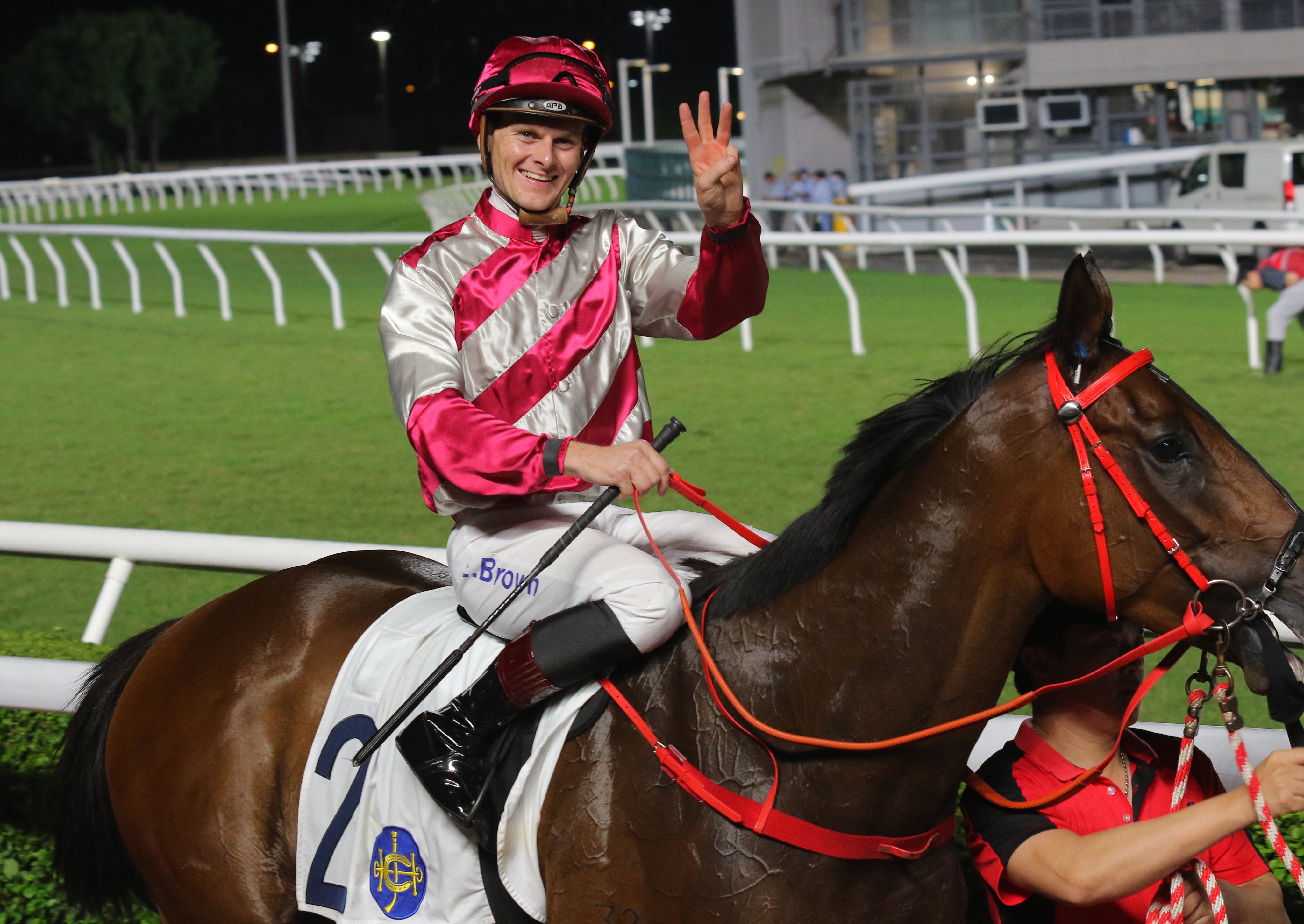 Ethan Brown celebrates his Sha Tin treble. Photos: Kenneth Chan
