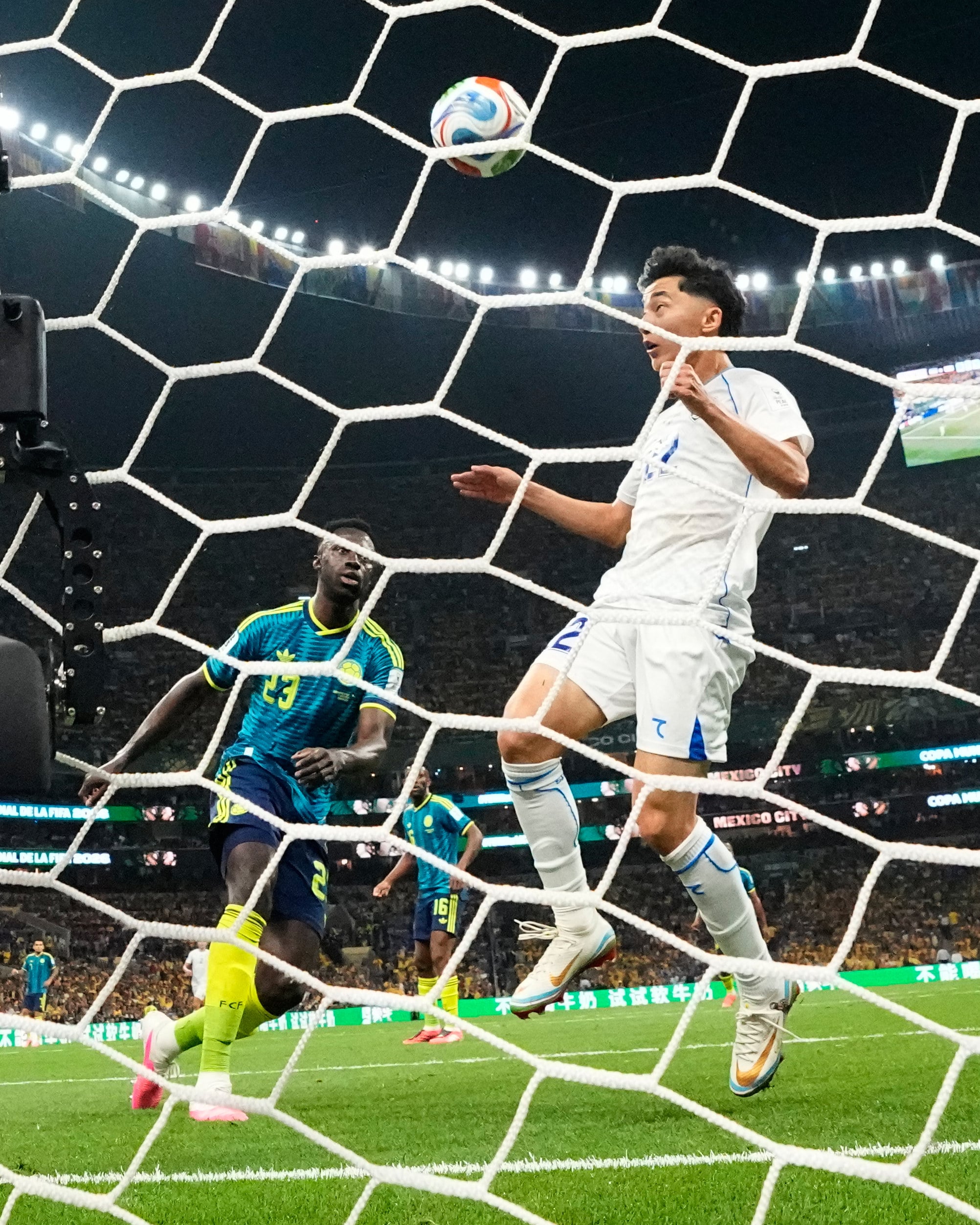 Uzbekistan’s Abbosbek Fayzullaev scores his team’s first goal at a World Cup during their 3-1 Group K defeat at the hands of Colombia. Photo: AP