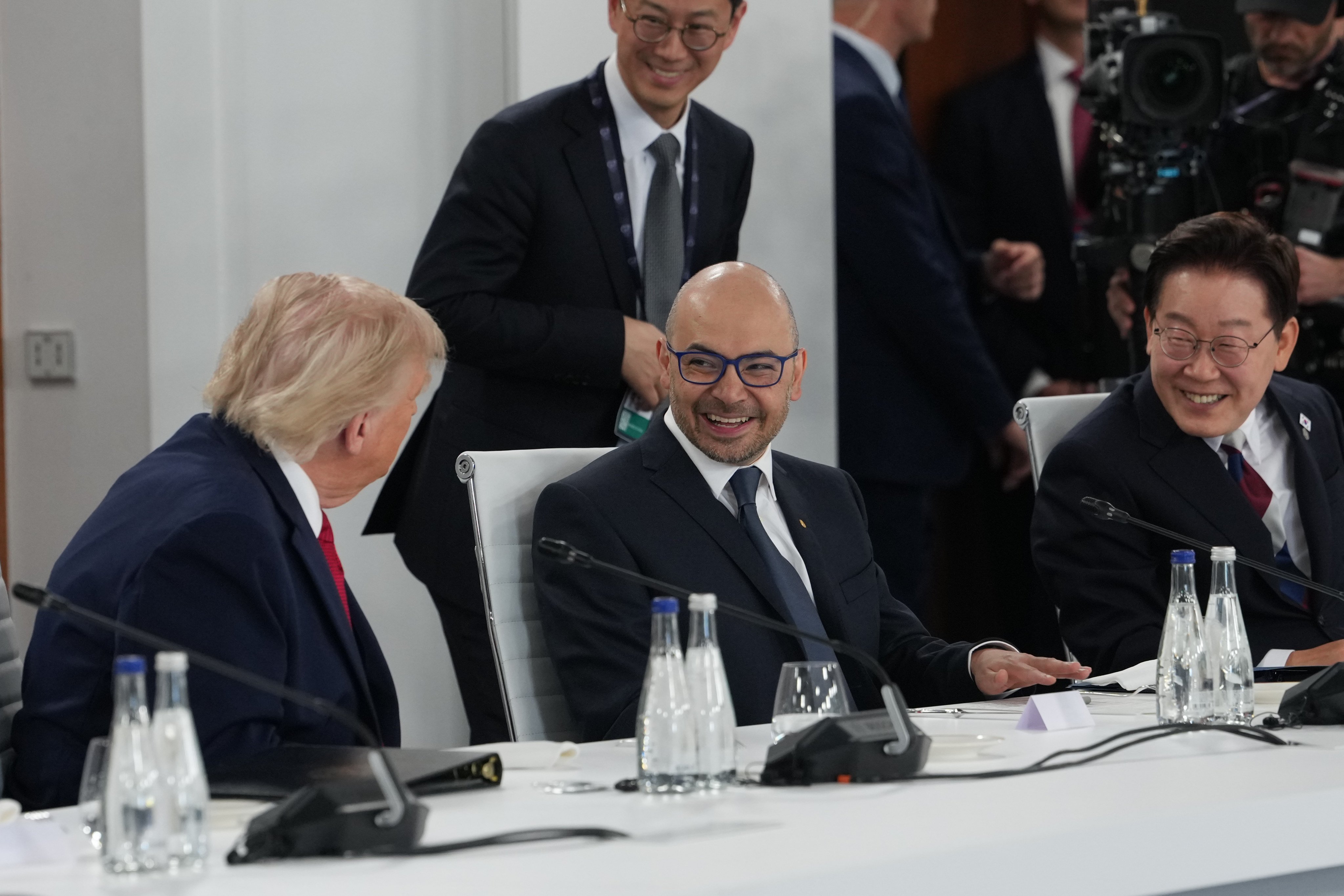 South Korea’s President Lee Jae Myung (right) with US leader Donald Trump and CEO of Google DeepMind Demis Hassabis (centre) during the G7 summit on Wednesday in Evian-les-Bains, France. Photo: Pool AP via AP