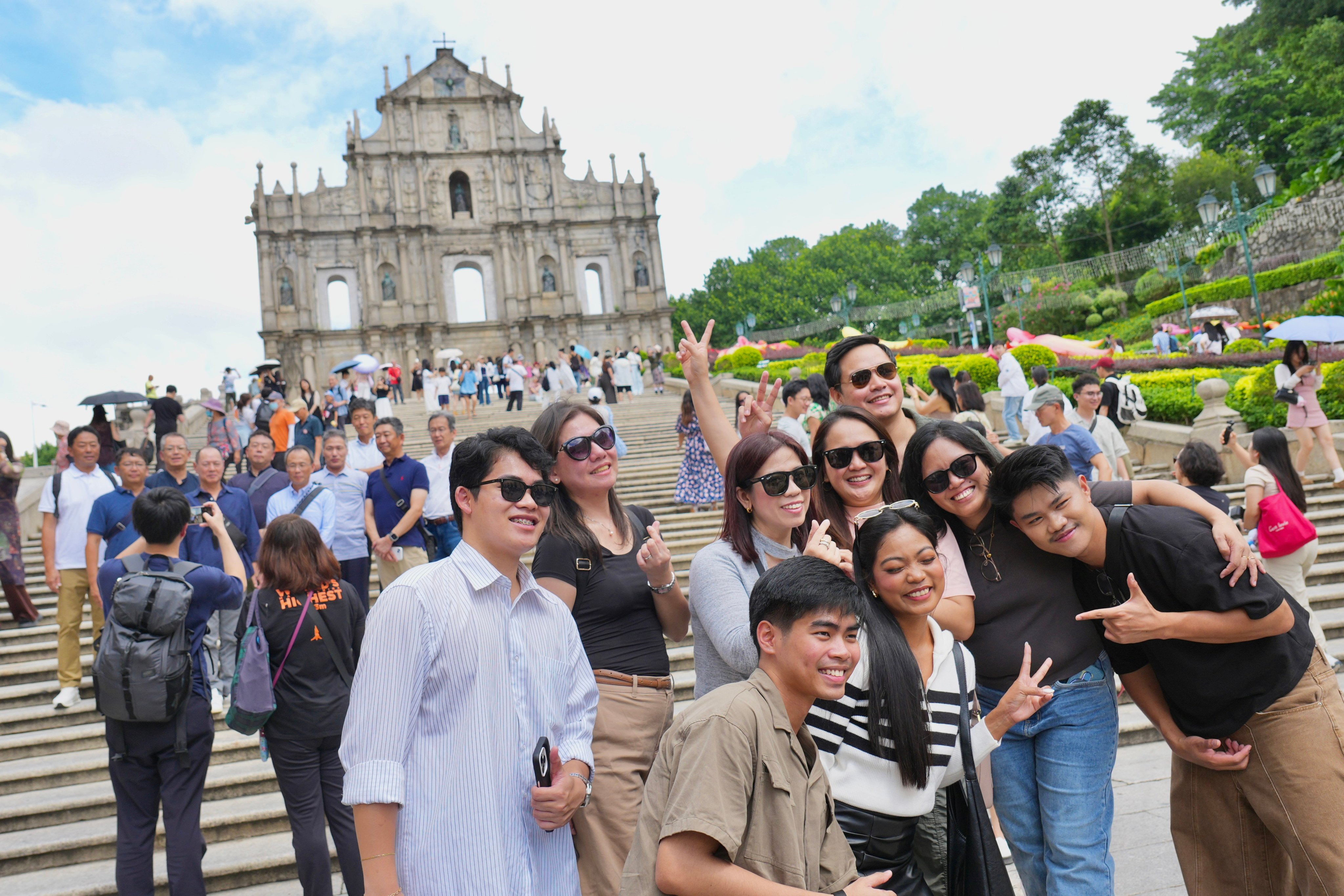 Tourists enjoy a visit to the Ruins of St Paul’s in Macau. Photo: Karma Lo