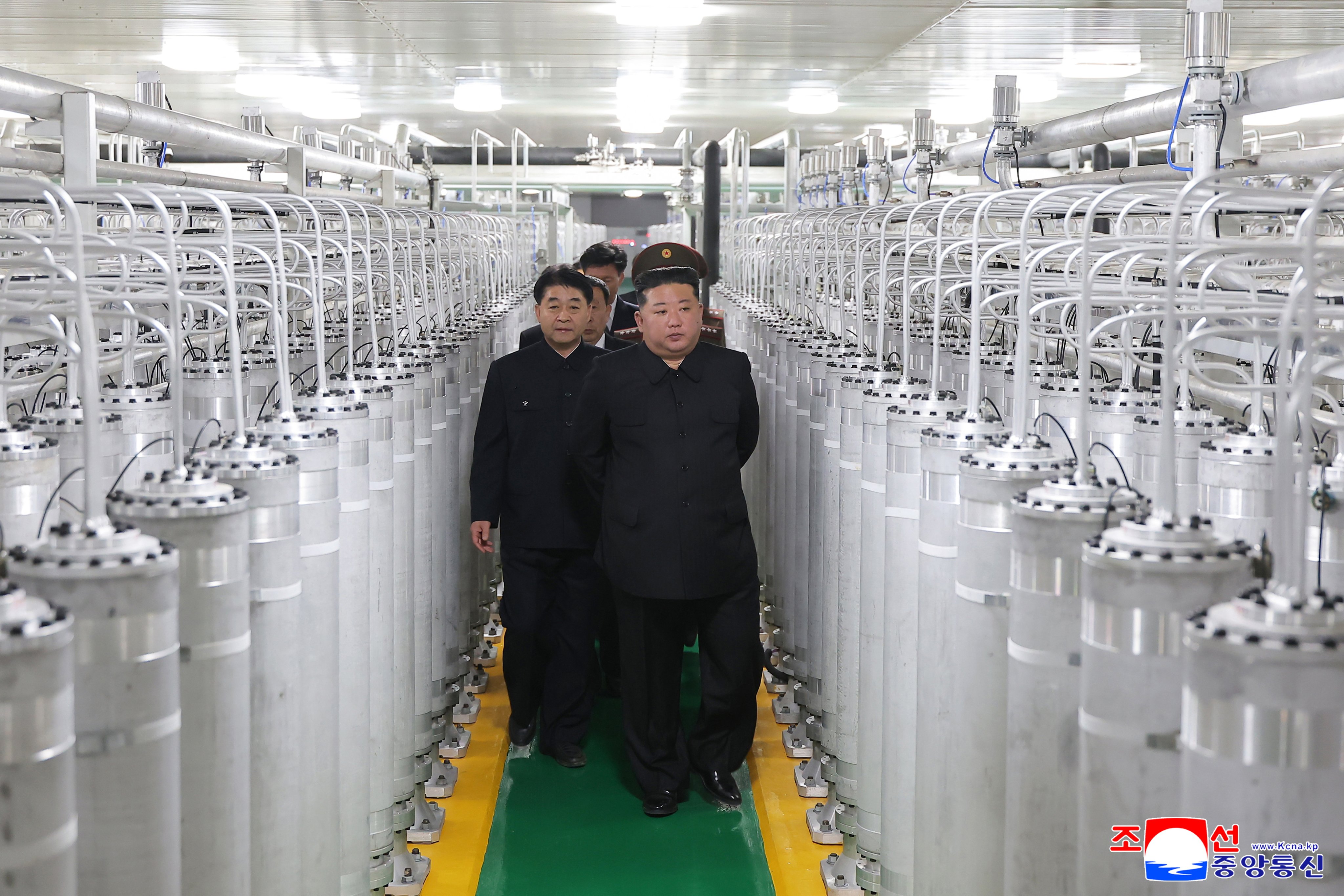North Korean leader Kim Jong-un (front)  inspects a nuclear materials production factory on June 3. Photo: KCNA/EPA