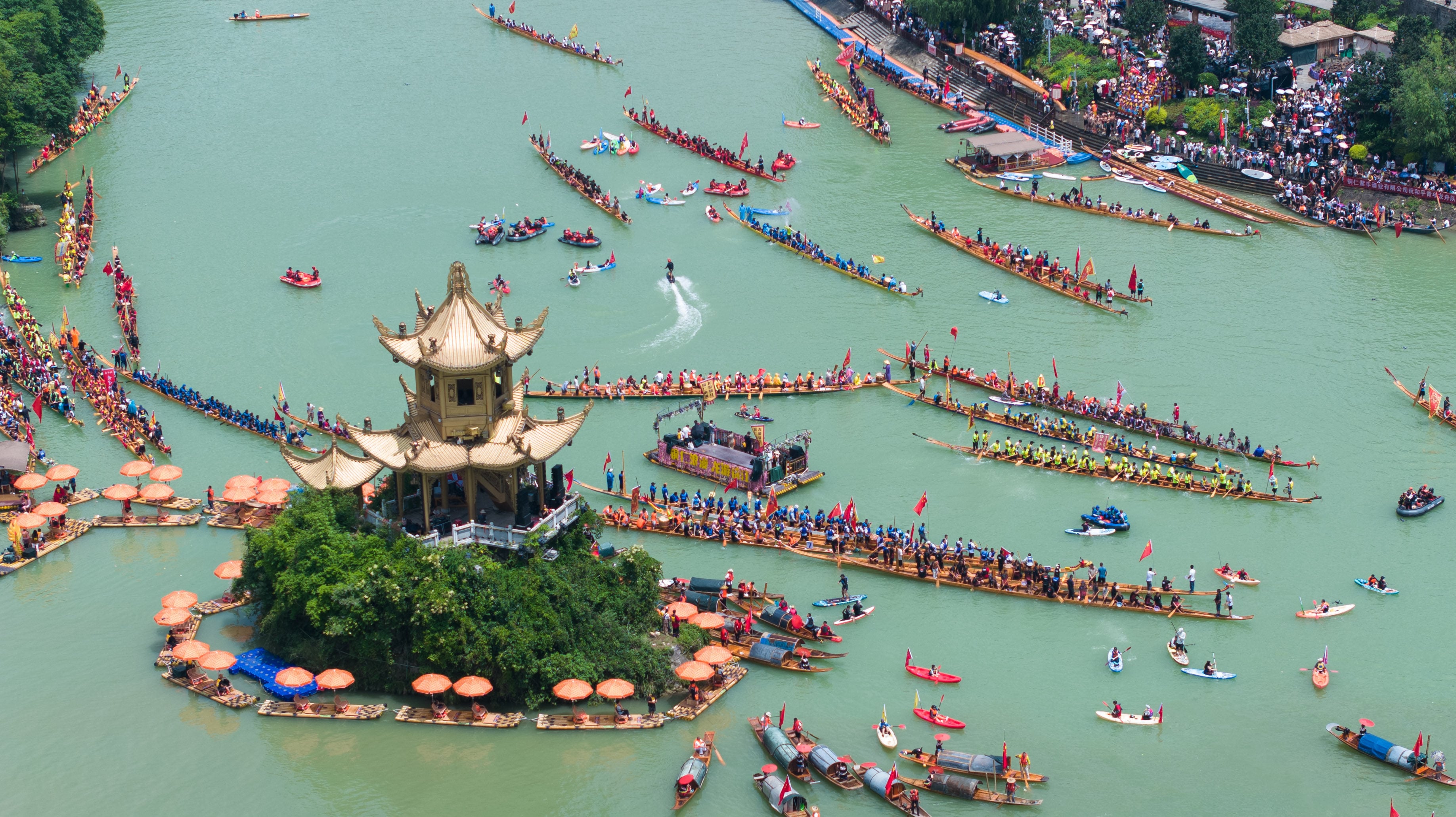 Dragon boat crews take part in a waterborne parade in Tongren, southwest China’s Guizhou province, ahead of the Dragon Boat Festival holiday. Photo: Xinhua