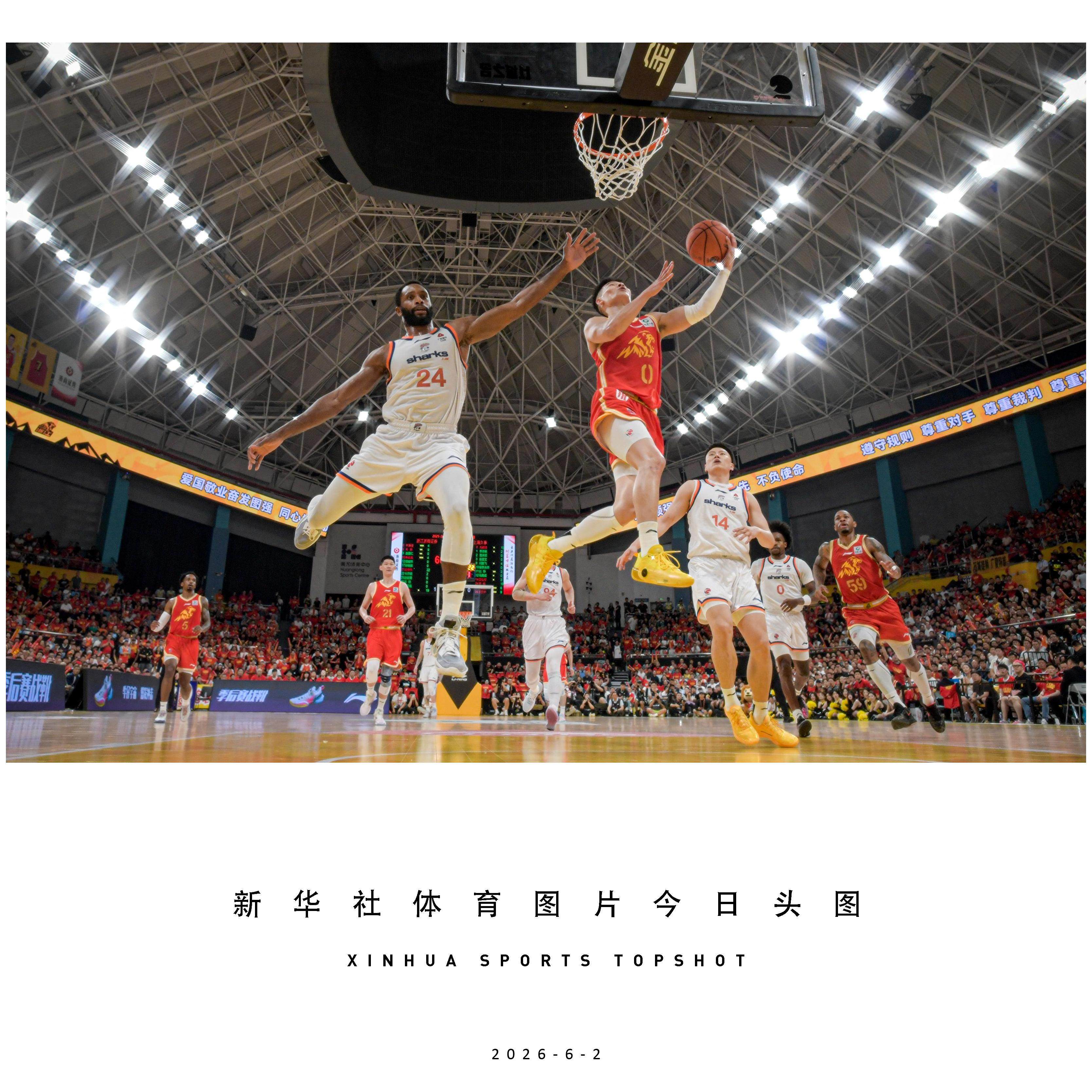 Lin Bingsheng (right) of Zhejiang Lions goes for a lay-up against Shanghai Sharks in the finals of the CBA 2025-2026 season, won by the Sharks. Photo: Xinhua