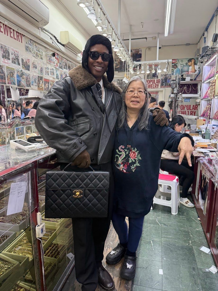 A$AP Rocky poses with Eva Sam at Sam’s Chinatown goldsmith shop Popular Jewelry, which has become a hip-hop landmark, in New York City. The rapper has developed a friendship with Macau-born Sam since his first visit in the early 2010s. Photo: Popular Jewelry