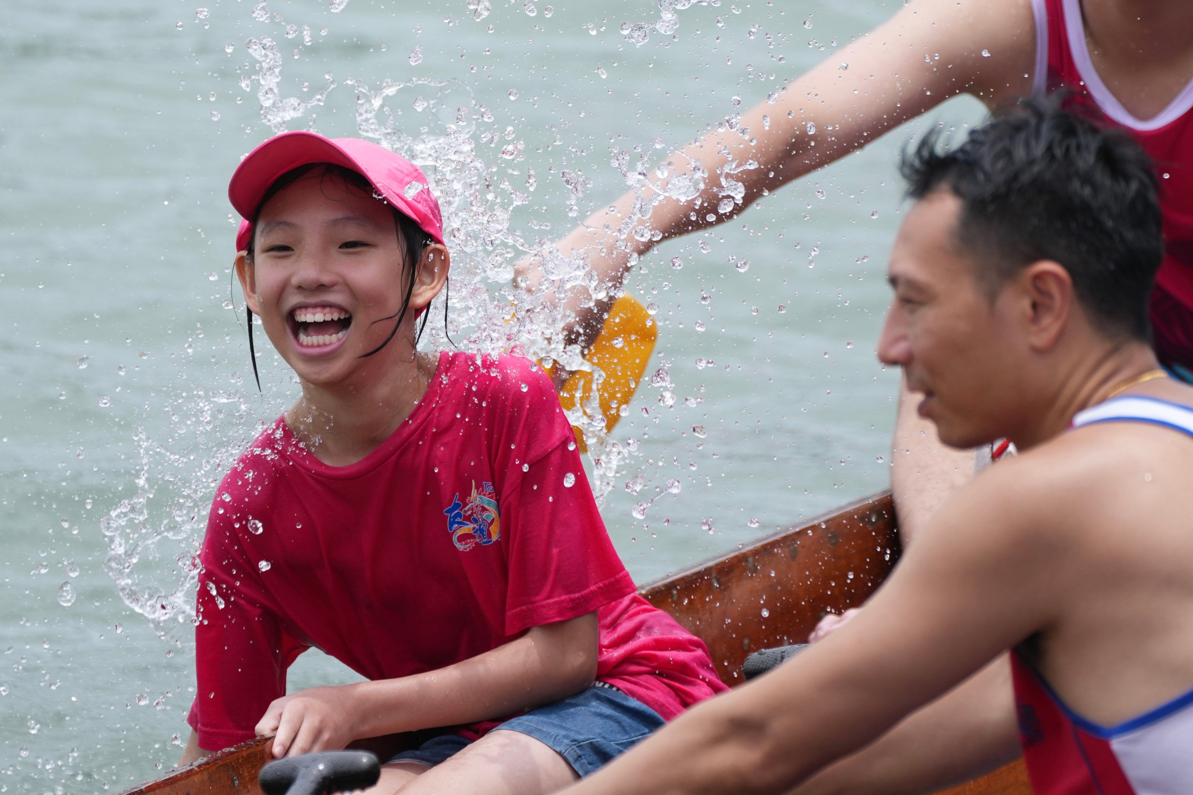 Residents make a splash in the waters off Lantau Island. Photo: Karma Lo