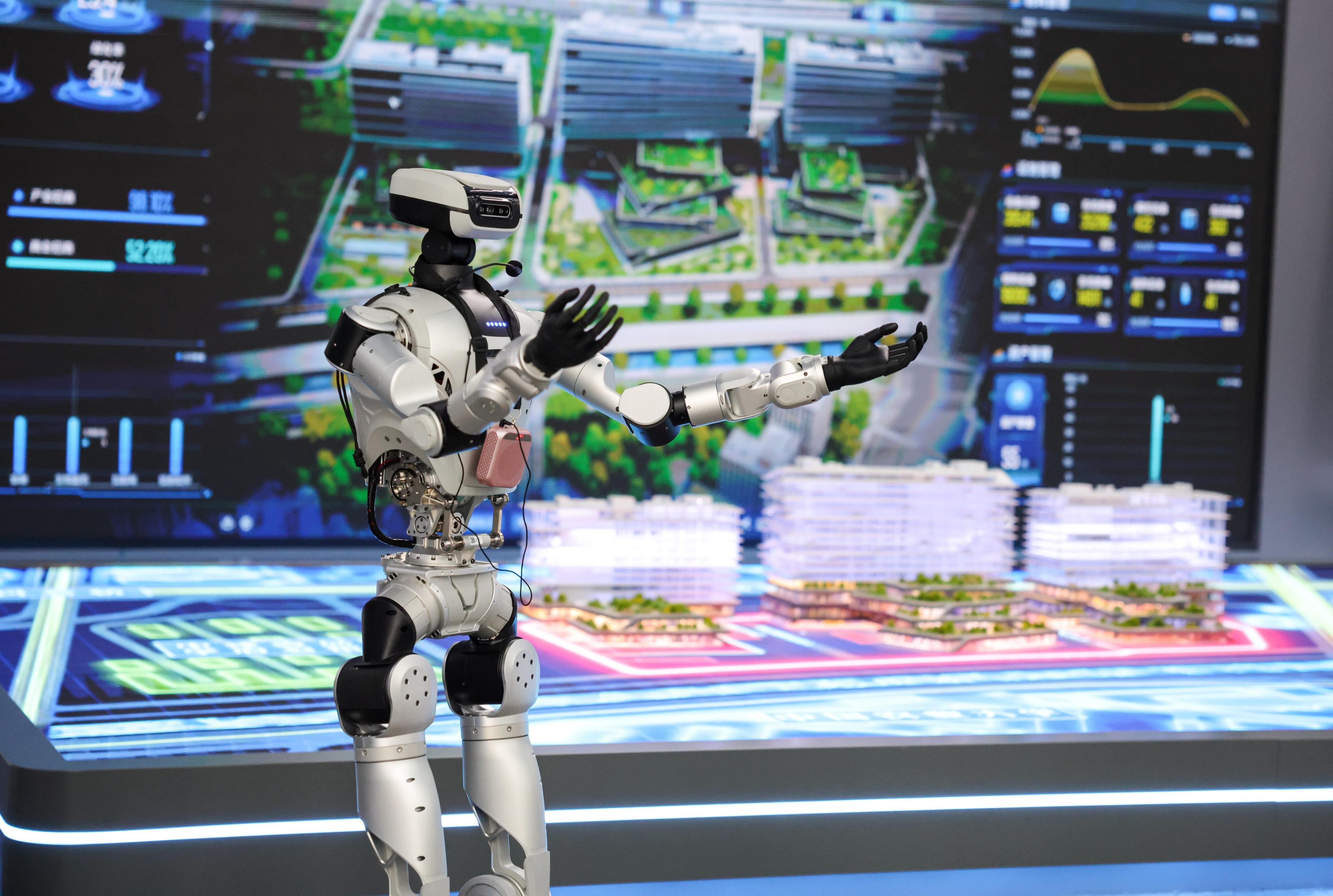A robot introduces visitors to an embodied intelligence innovation industrial estate in Zhongguancun, in Beijing’s Haidian district, on Saturday. Photo: Xinhua