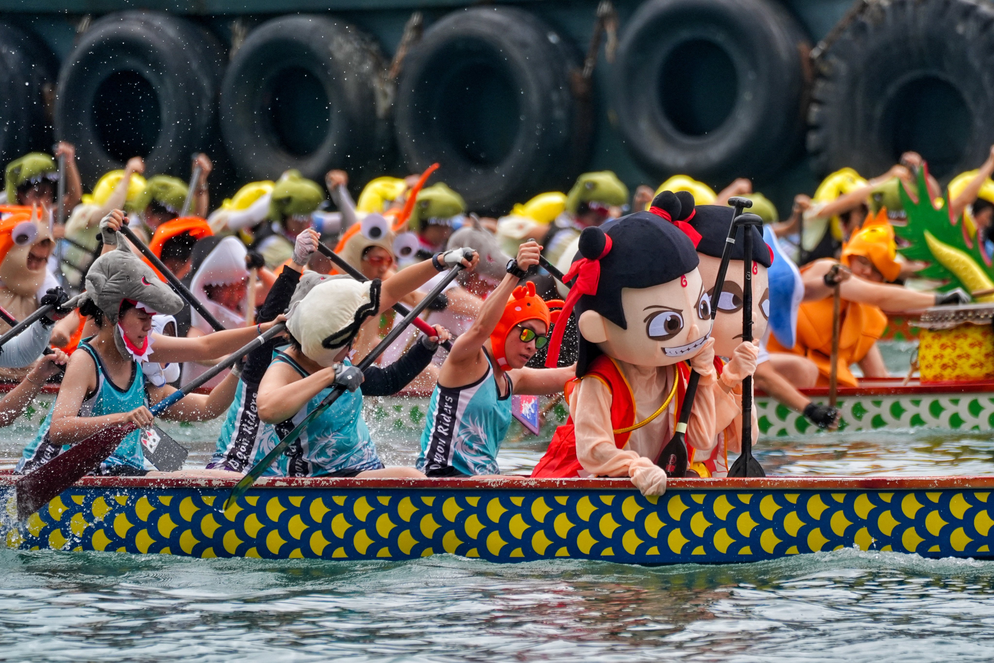 Dragon boat teams add a dash of extra colour to the Aberdeen event. Photo: Elson Li