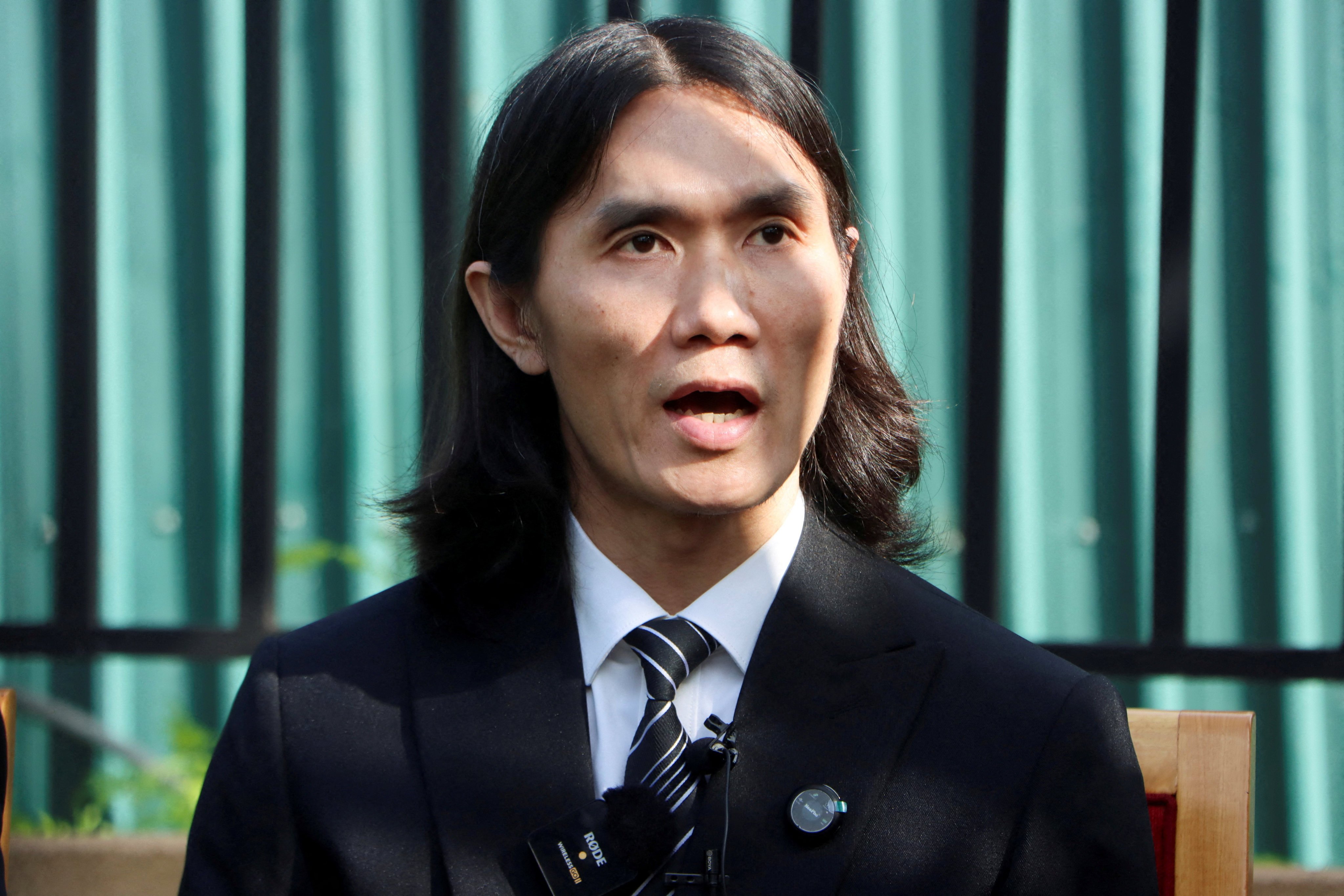 Vietnamese deportee Tuan Phan, who spent nearly a year in South Sudan, speaks during a press conference before his departure from Juba International Airport on Friday. Photo: Reuters