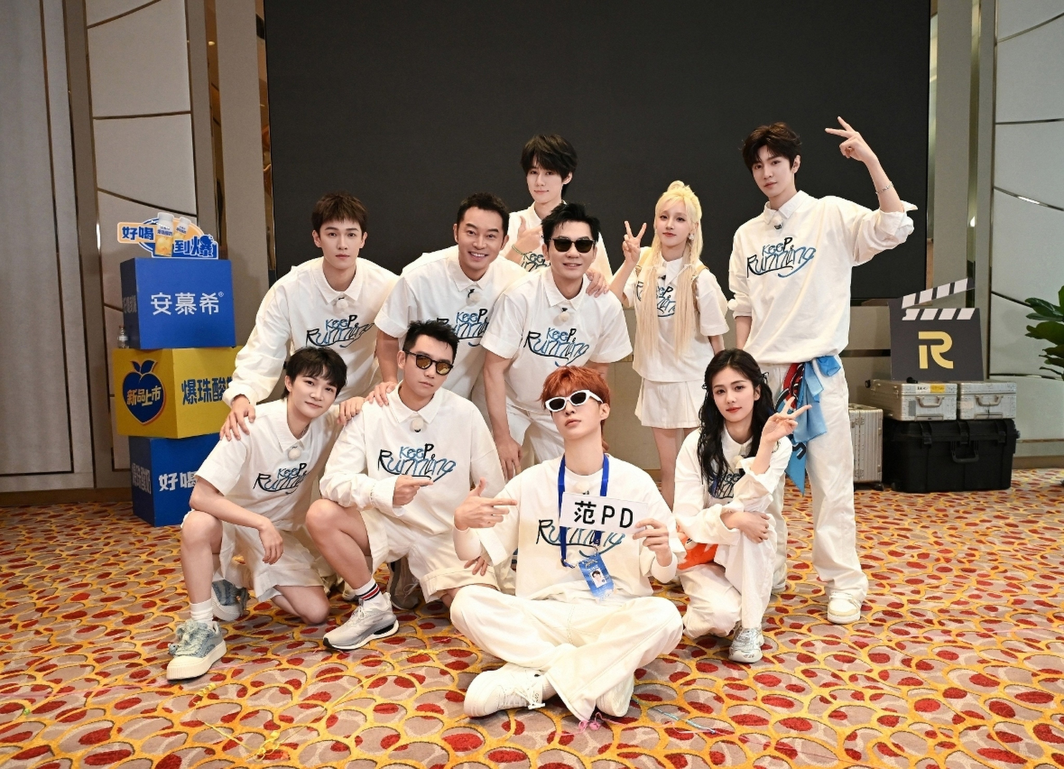 Cast members from the Chinese reality television show Keep Running pose for a photograph. Photo: Handout