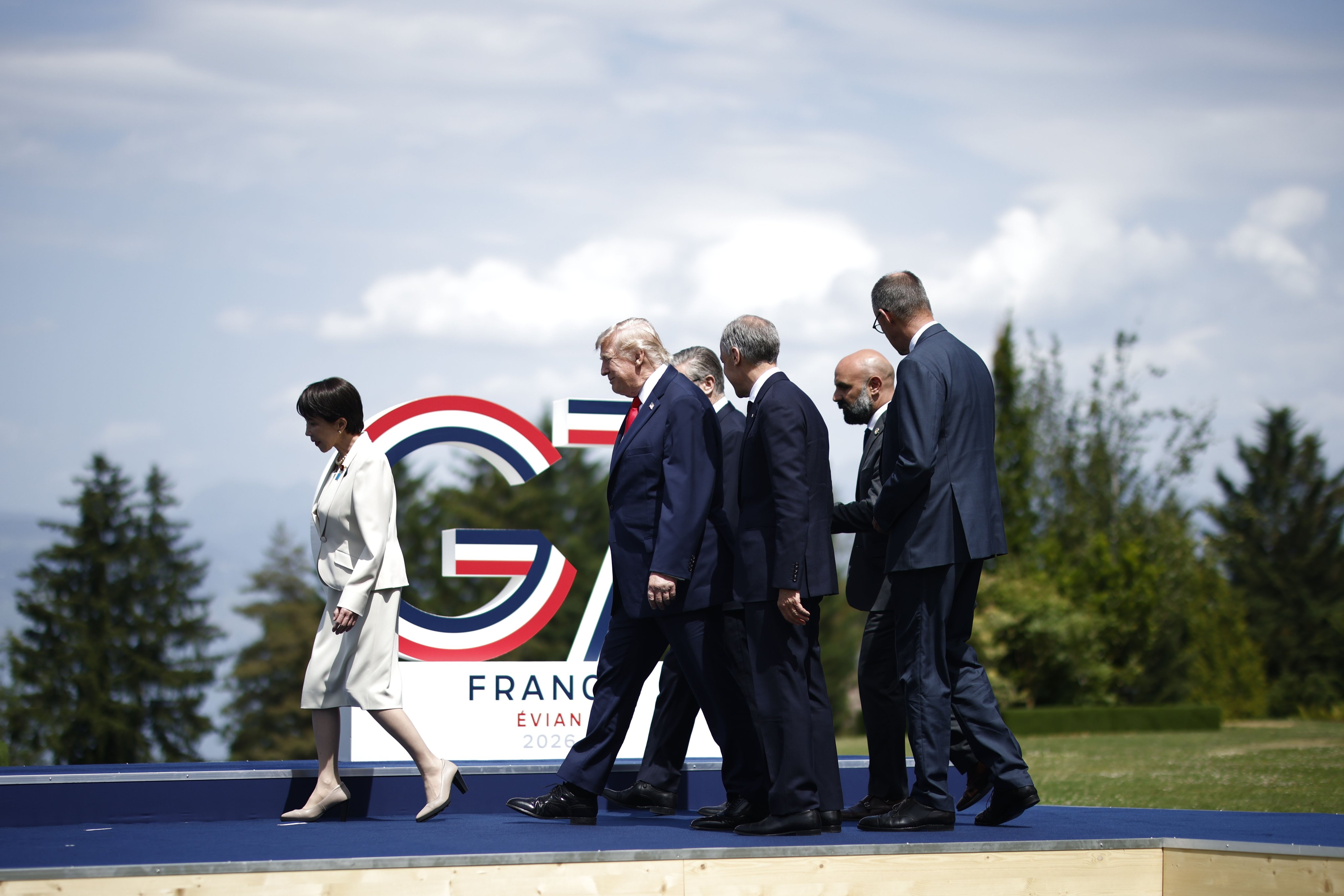 (From left) Japanese Prime Minister Sanae Takaichi, US President Donald Trump, Canadian Prime Minister Mark Carney and German Chancellor Friedrich Merz prepare for a group picture at Hotel Royal during the G7 summit in Evian-les-Bains, France on June 16. Photo: EPA
