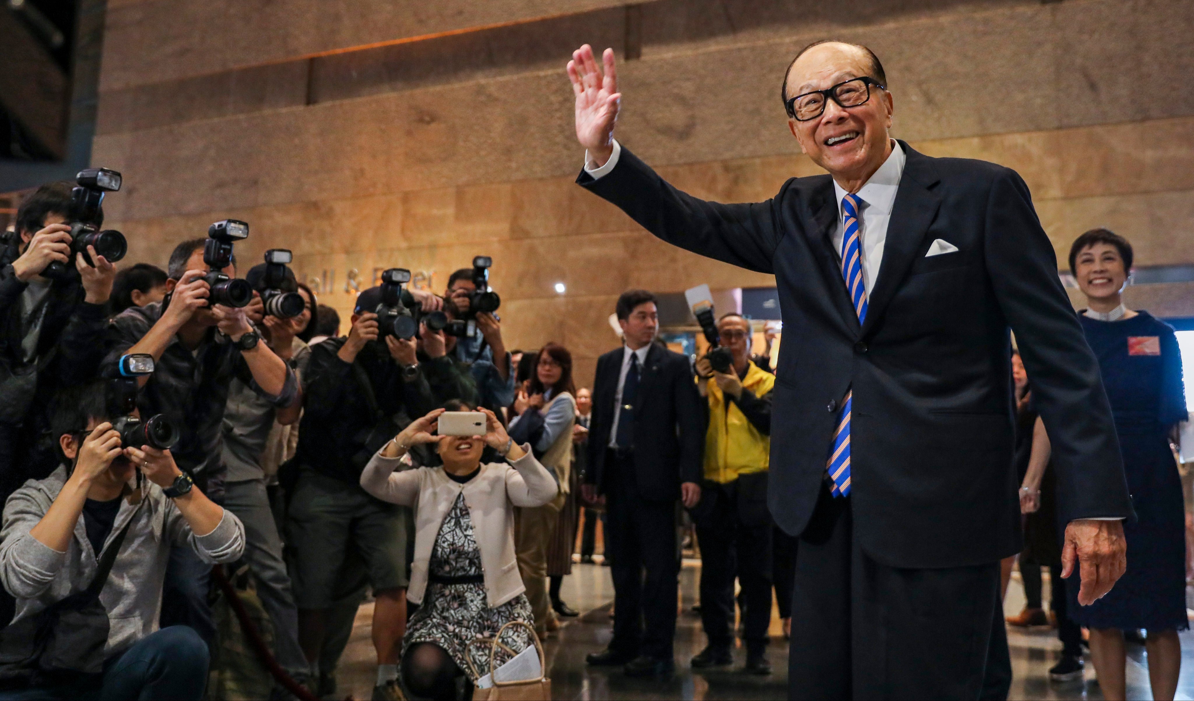 Li Ka-shing meets the media at the Hong Kong Convention and Exhibition Centre in Wan Chai in January 2019. The multibillionaire tycoon is arguably the most well-known Teochew person in Hong Kong. Photo: Felix Wong