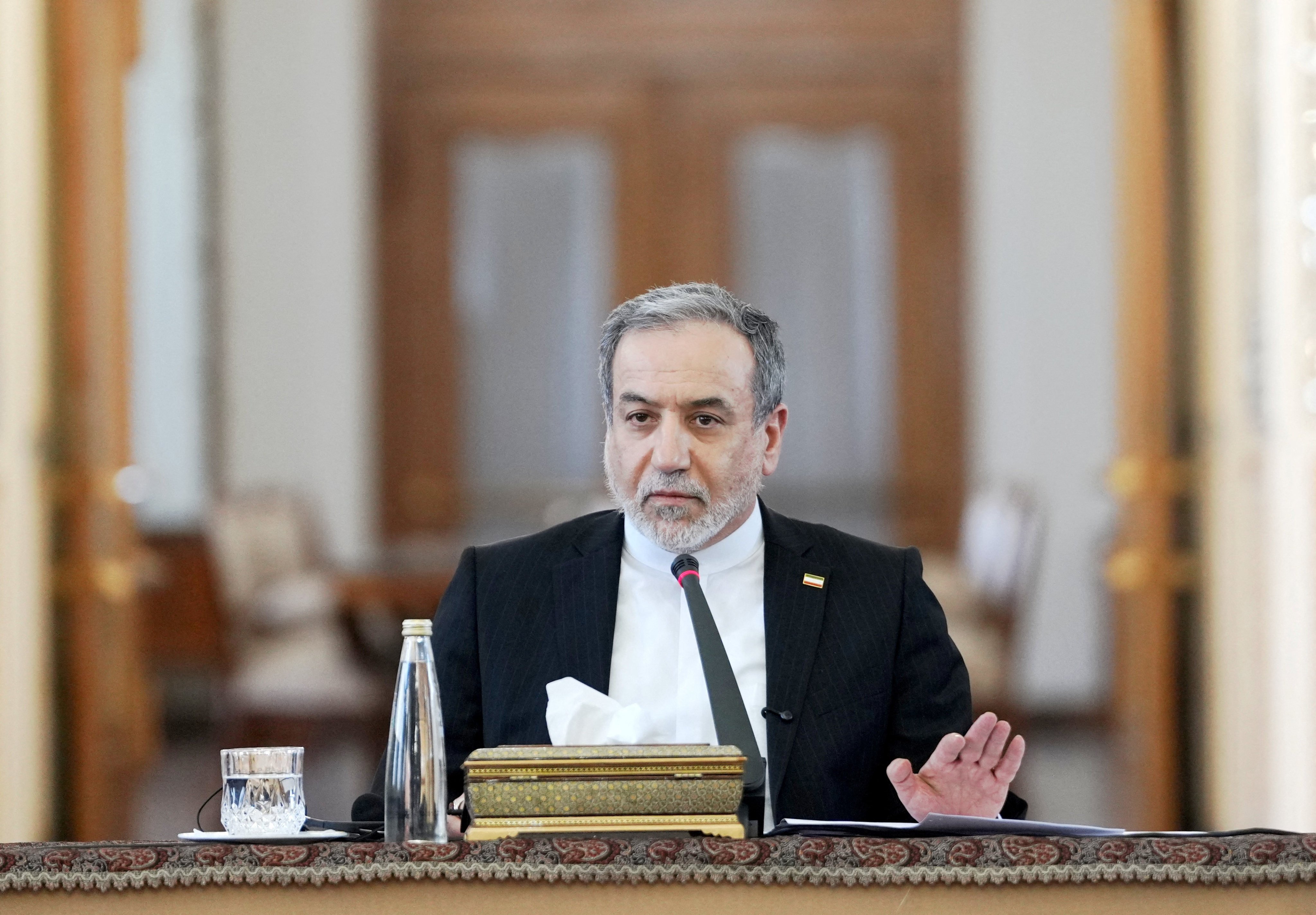 Iranian Foreign Minister Abbas Araqchi speaks during a meeting with foreign ambassadors, in Tehran on Tuesday. Photo: Handout via Reuters