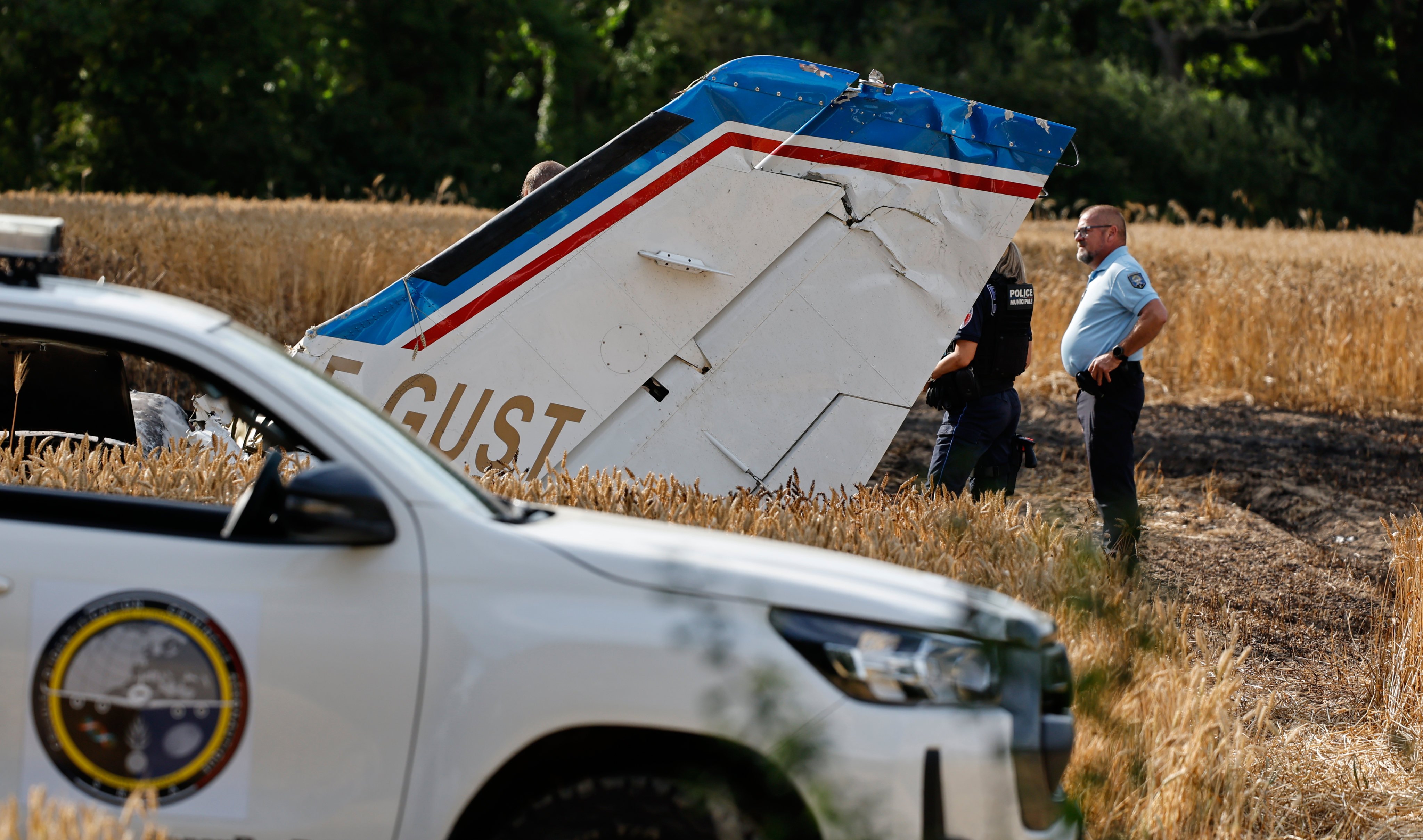 Forensic technicians on Saturday examine the wreckage of the Cessna 421 that crashed while approaching La Baule-Escoublac airfield in France. Photo: AP