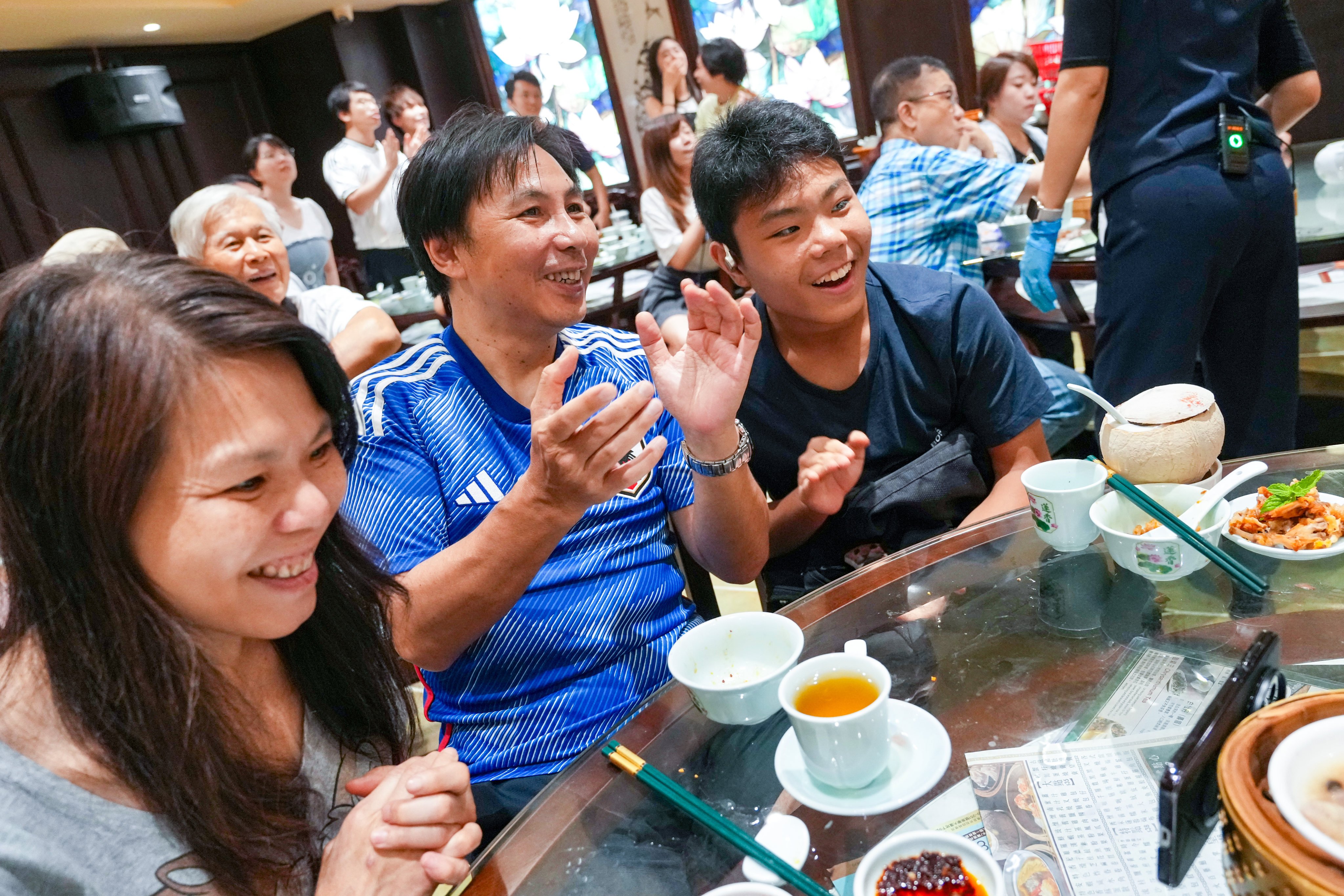 Carman Chan, Ricky Chan and Carson Chan celebrate Father's Day at the restaurant. Photo: Karma Lo