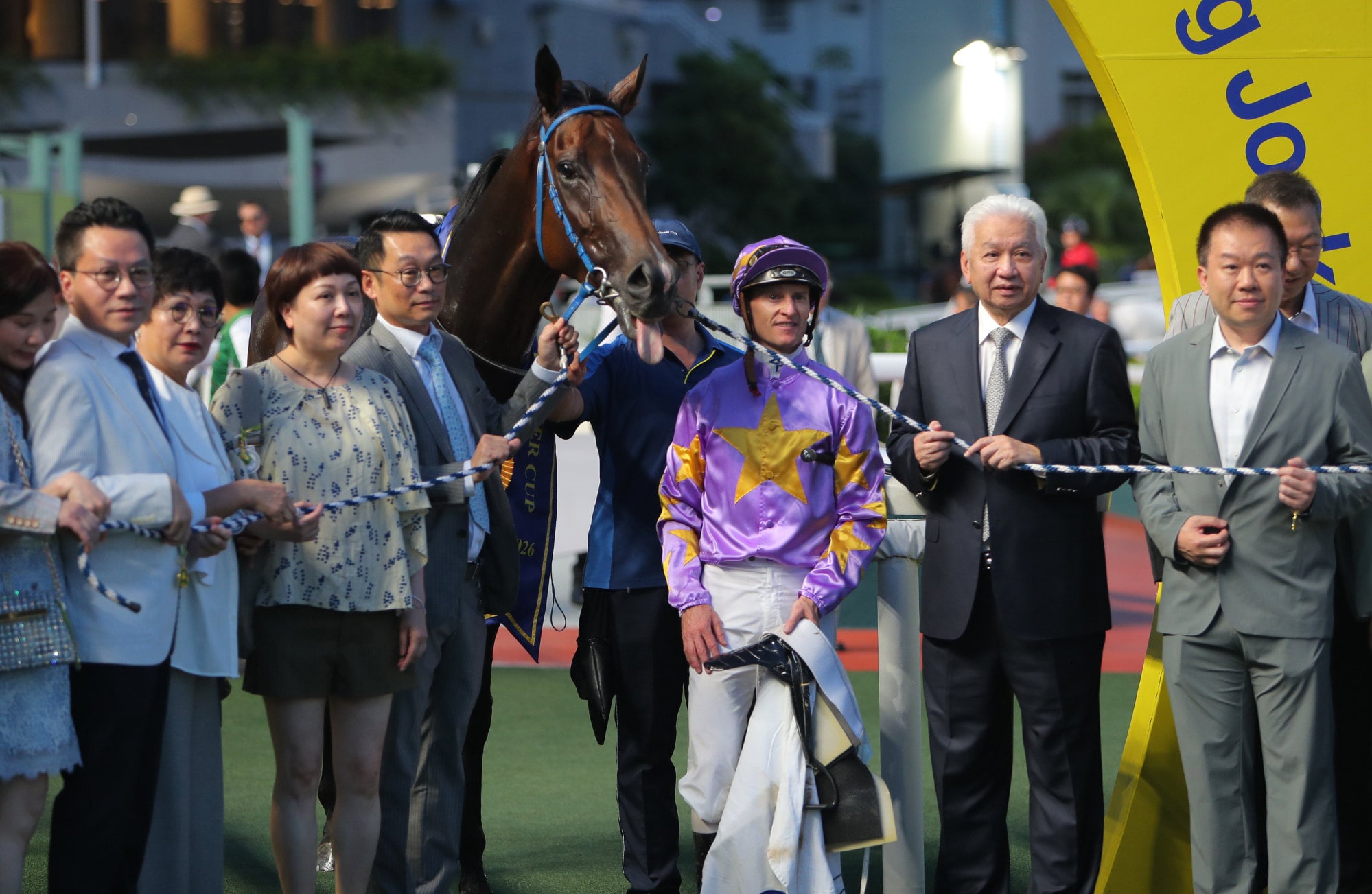 Connections celebrate the win of Little Paradise in the Group Three Premier Cup at Sha Tin. Connections celebrate the win of Little Paradise in the Group Three Premier Cup at Sha Tin.