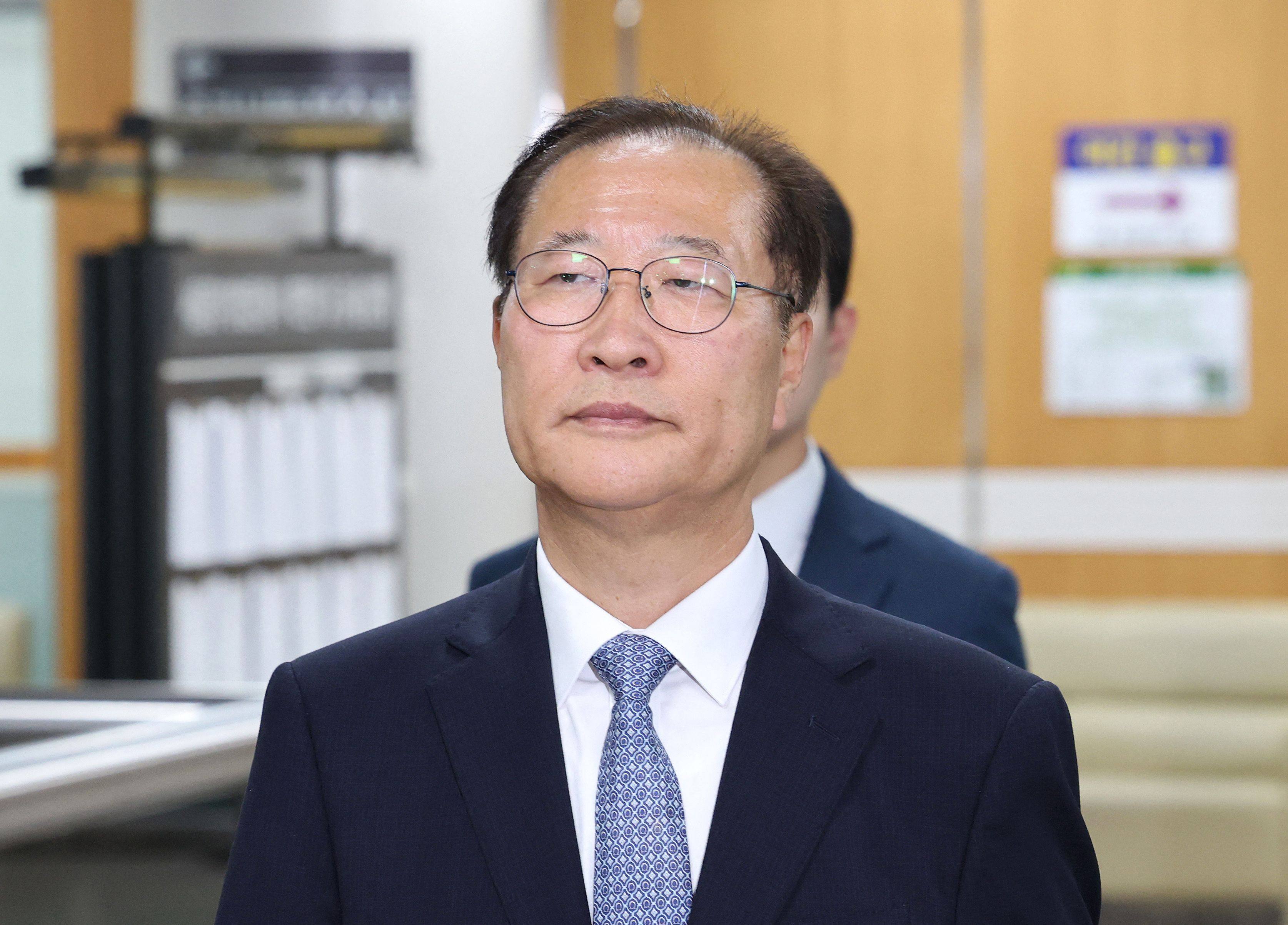 Former South Korean justice minister Park Sung-jae arrives for his trial at the Seoul Central District Court in Seoul on Monday. Photo: Yonhap/AFP