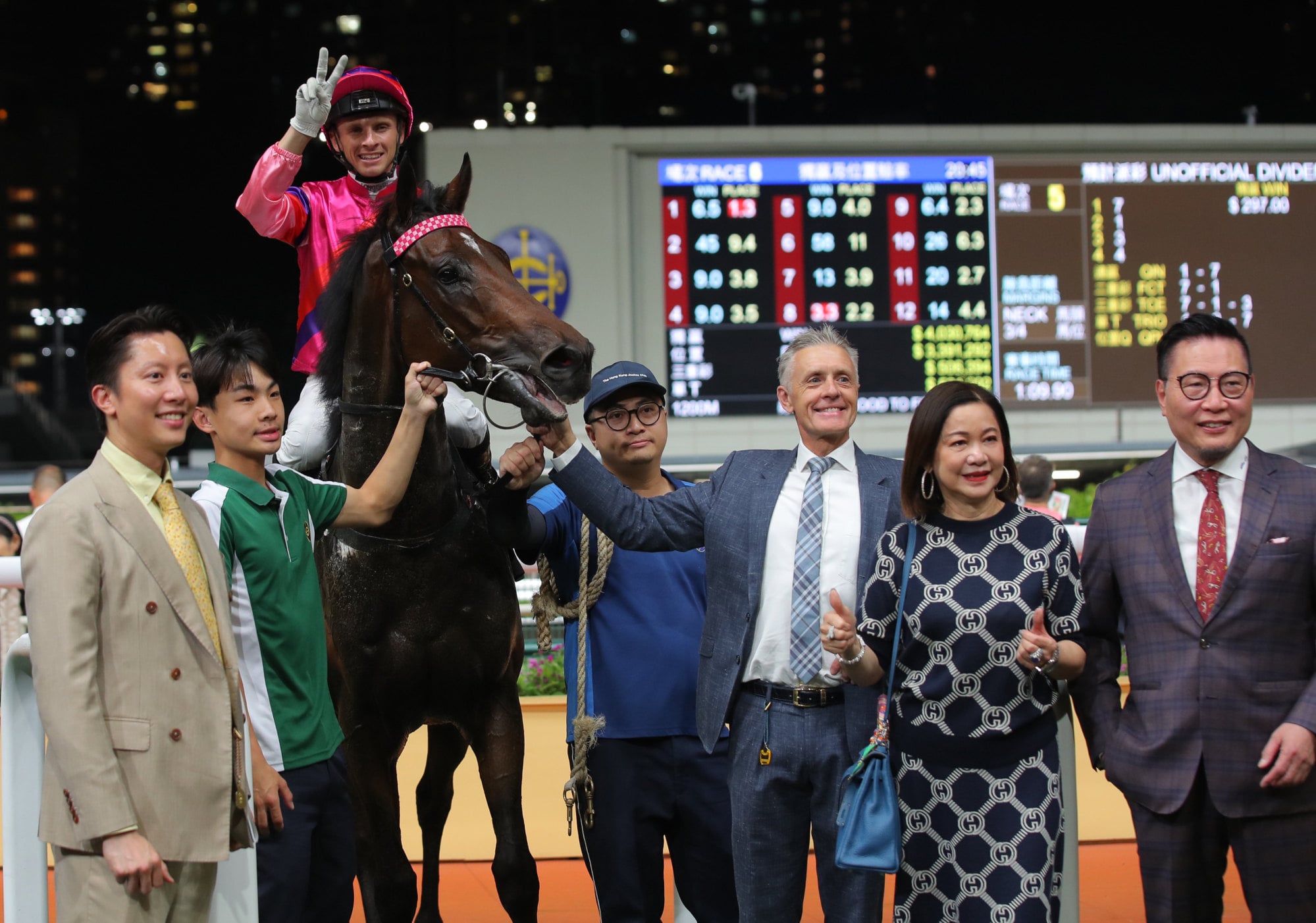 Connections celebrate the win of King Lotus at Happy Valley. Connections celebrate the win of King Lotus at Happy Valley.