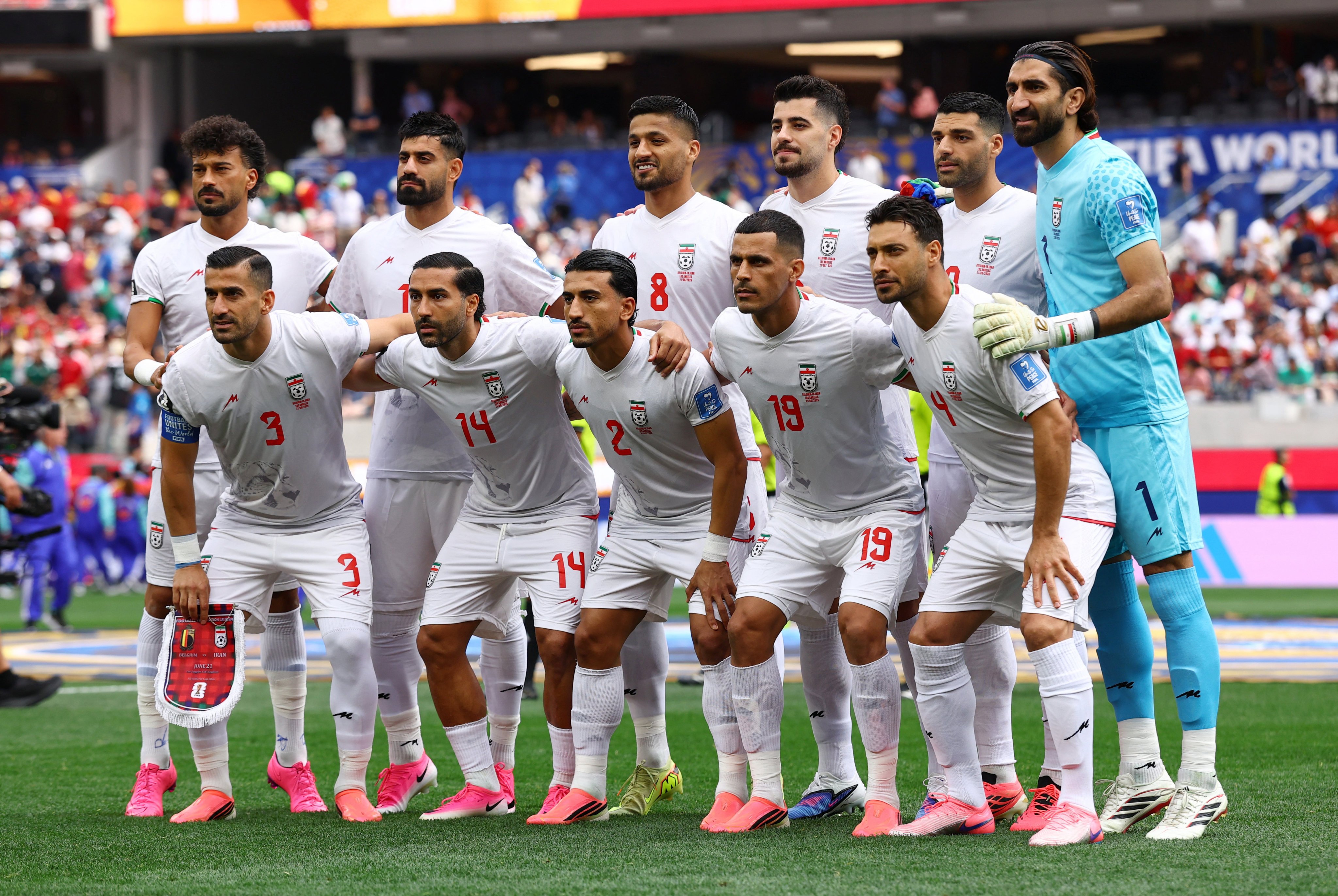 Iran players pose for a team photo before their match against Belgium in Inglewood, Los Angeles on Sunday. Photo: Reuters