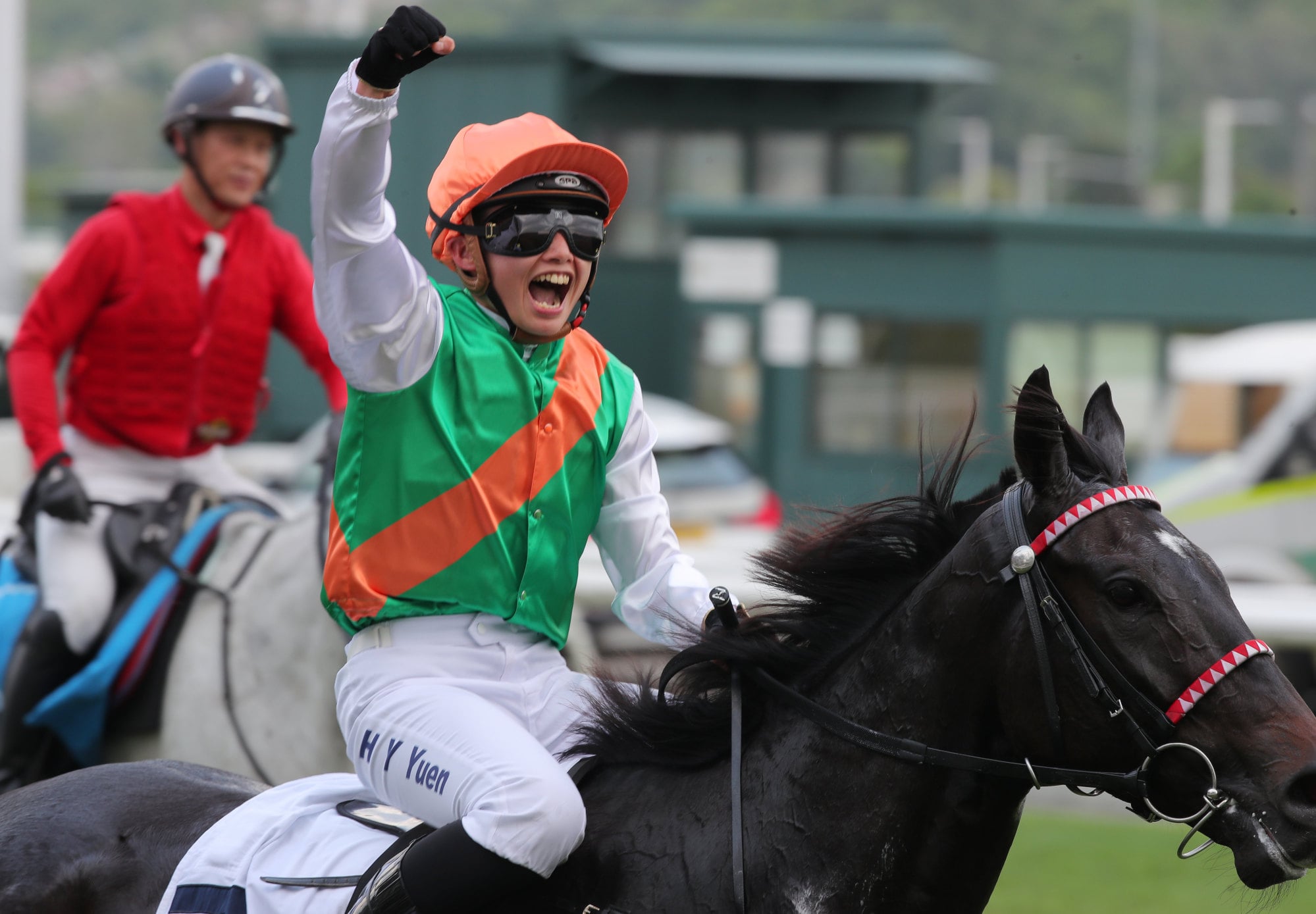Nichola Yuen celebrates a Sha Tin winner. Nichola Yuen celebrates a Sha Tin winner.