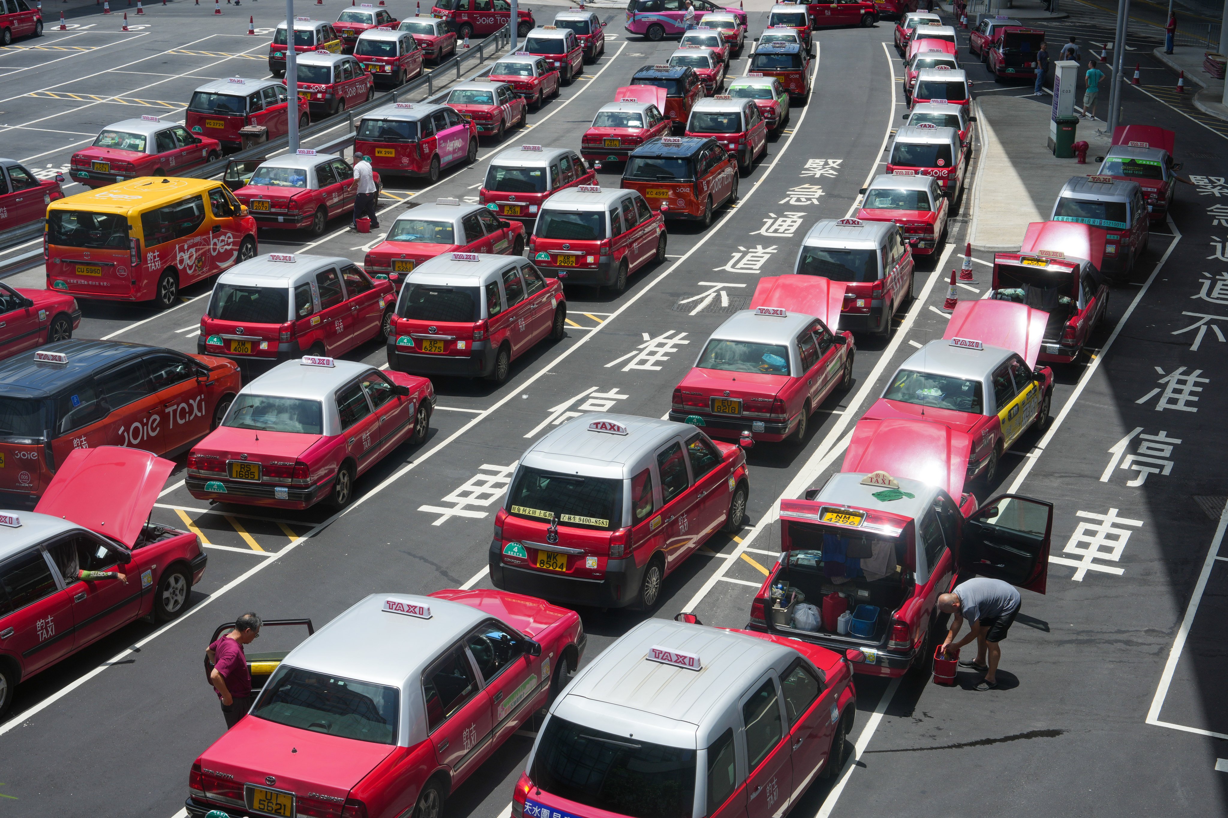 Taxis at the Airport Taxi Stan at Hong Kong International Airport, Chek Lap Kok.