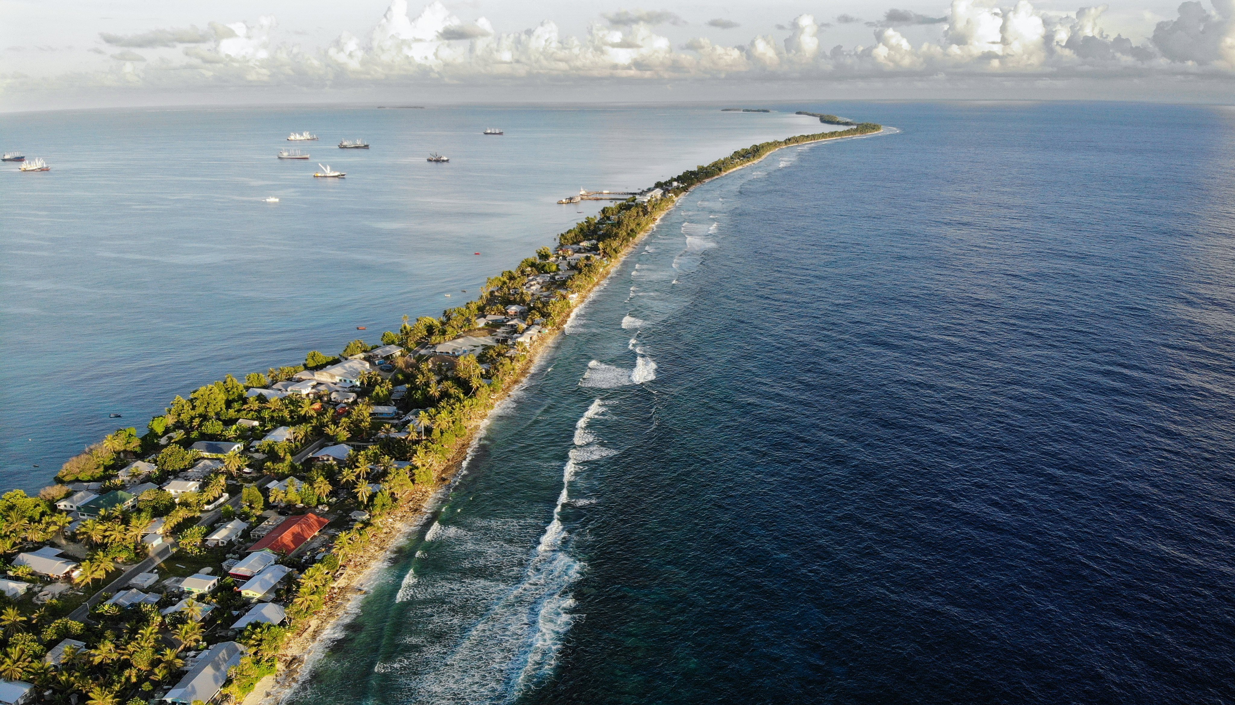 An aerial view of a strip of land in Funafuti, Tuvalu, in 2019. The low-lying South Pacific island nation of about 11,000 people is extremely vulnerable to climate change. Photo:  Getty Images