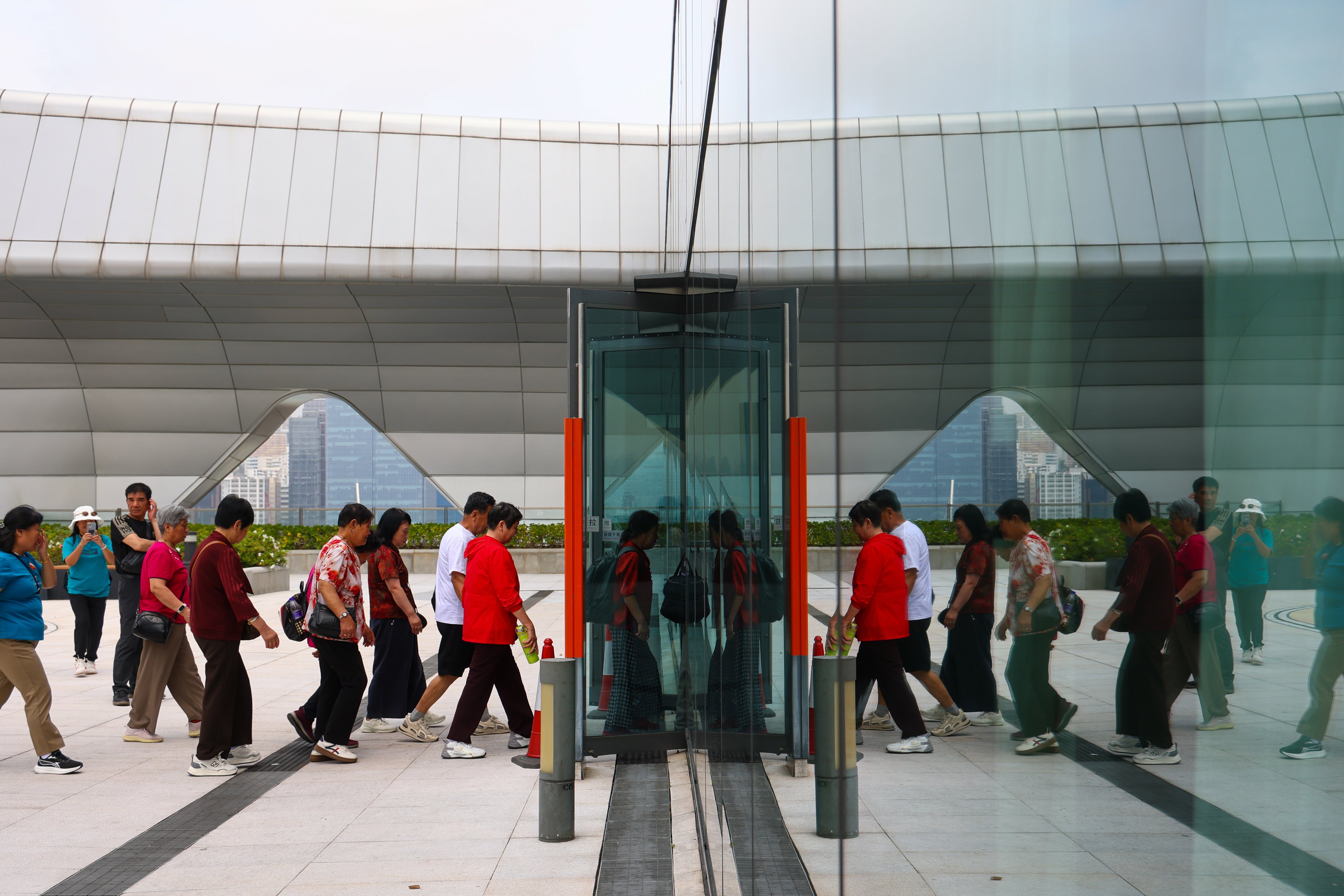 Passengers arrive at the Kai Tai Cruise Terminal. Hong Kong authorities have extended the tender deadline for the operation and management of the Kai Tak Cruise Terminal from May 22 to June 26, 2026. 27MAR26  SCMP / Dickson Lee