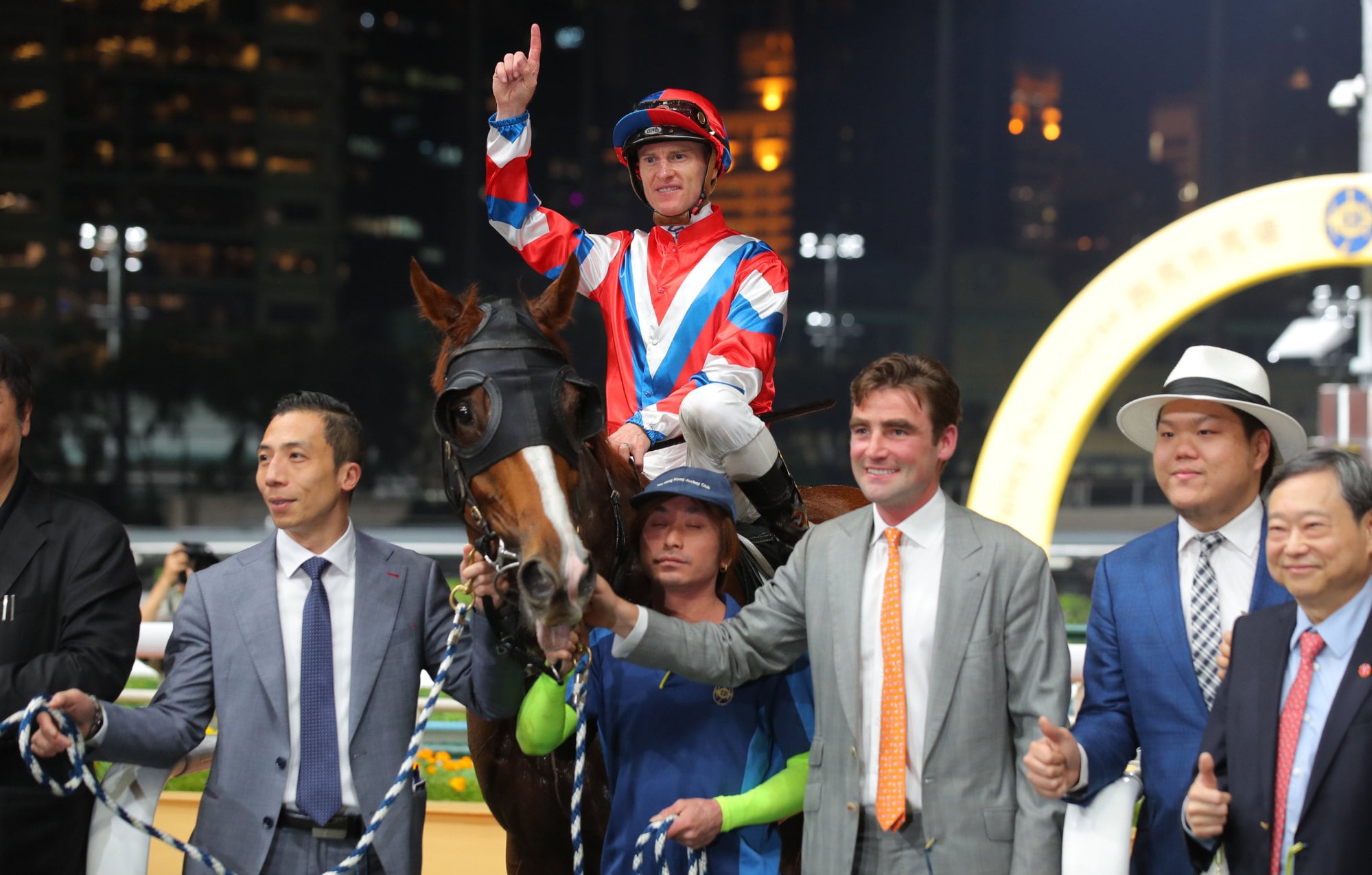 Connections celebrate the victory of Vivacious Win at Happy Valley. Connections celebrate the victory of Vivacious Win at Happy Valley.