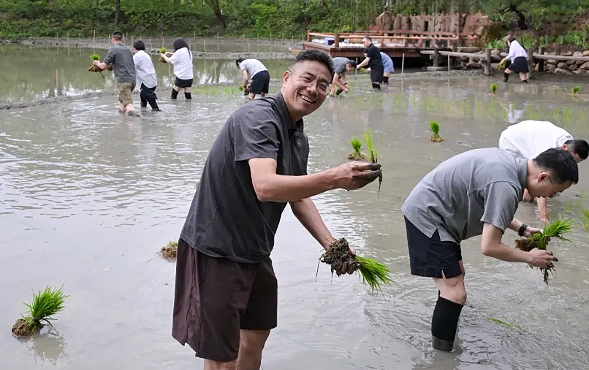 Liu Zhenfei, Alibaba partner and chairman of mapping service Amap, pictured at the rice-planting team-building event. Photo: Handout