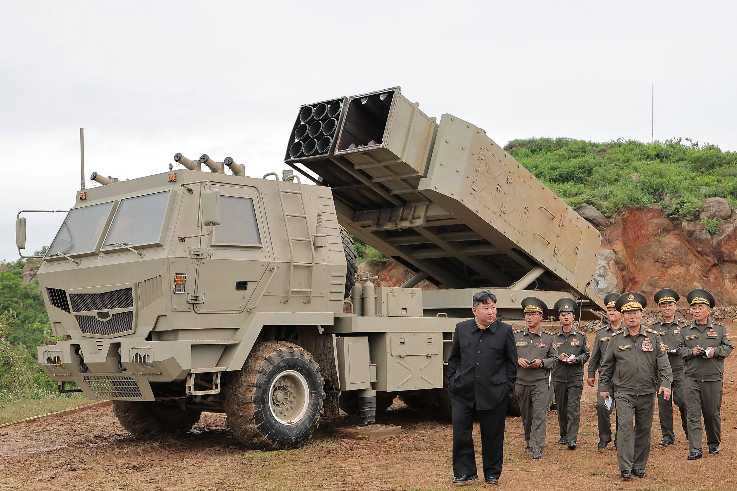 North Korean leader Kim Jong-un observes a new multipurpose missile launching system and tactical cruise missile weapon system at an unspecified location in May. Photo: KCNA/YNA/dpa