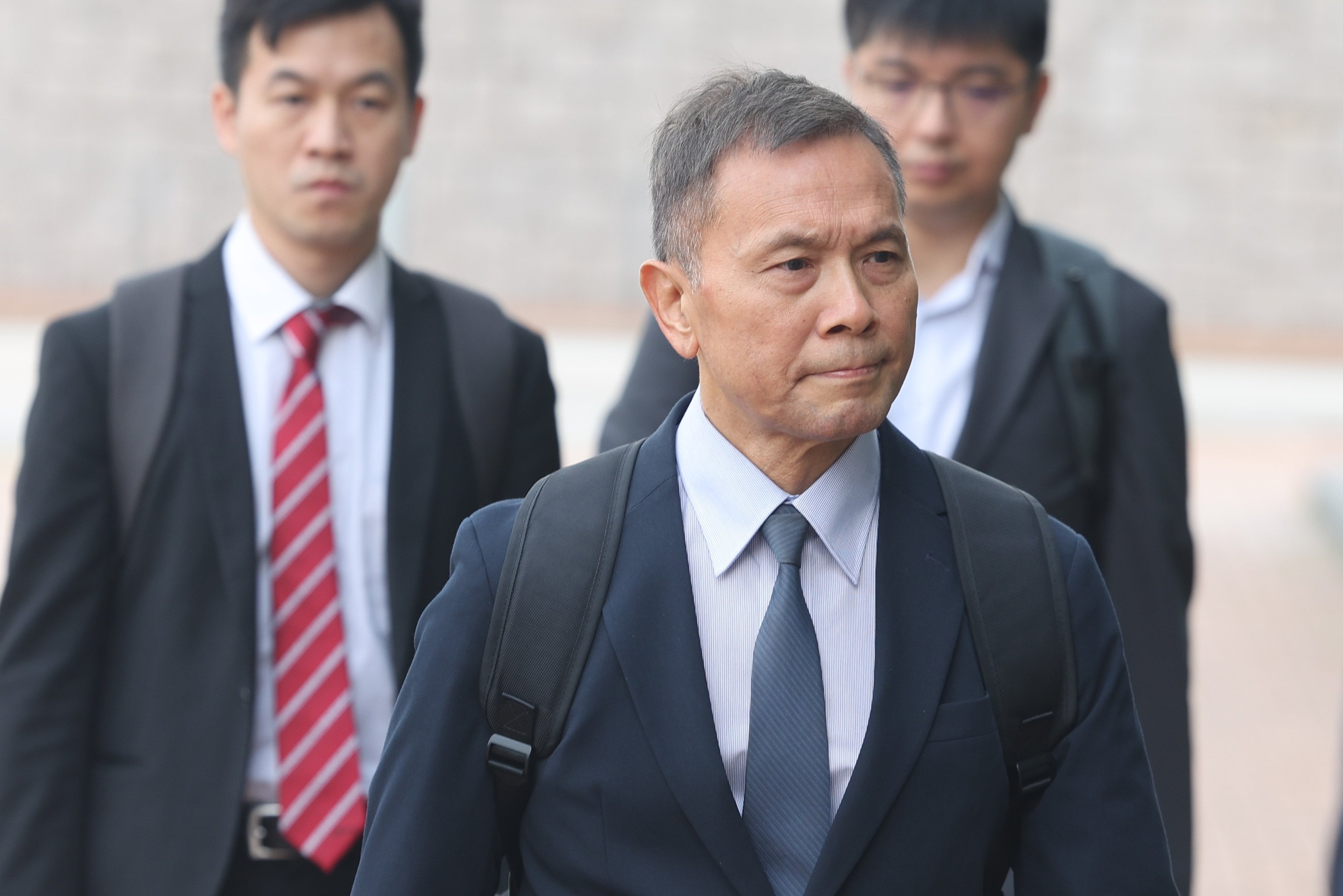 Richard Yuen, chair professor of architectural engineering at City University, arrives at City Gallery in Central on Wednesday. Photo: Edmond So