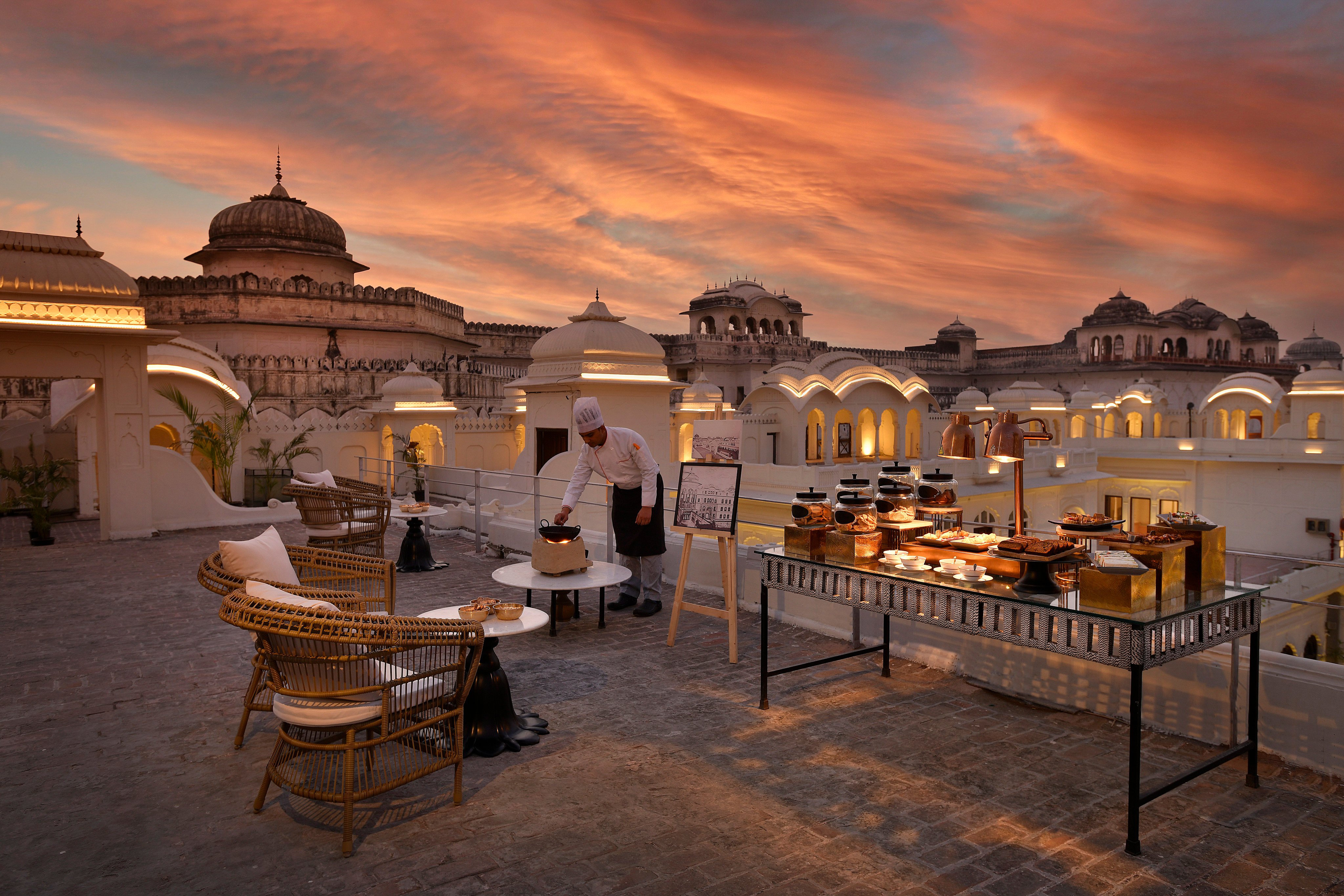 The high tea at Ran Baas, The Palace in India against a fiery sky. Photo: Handout