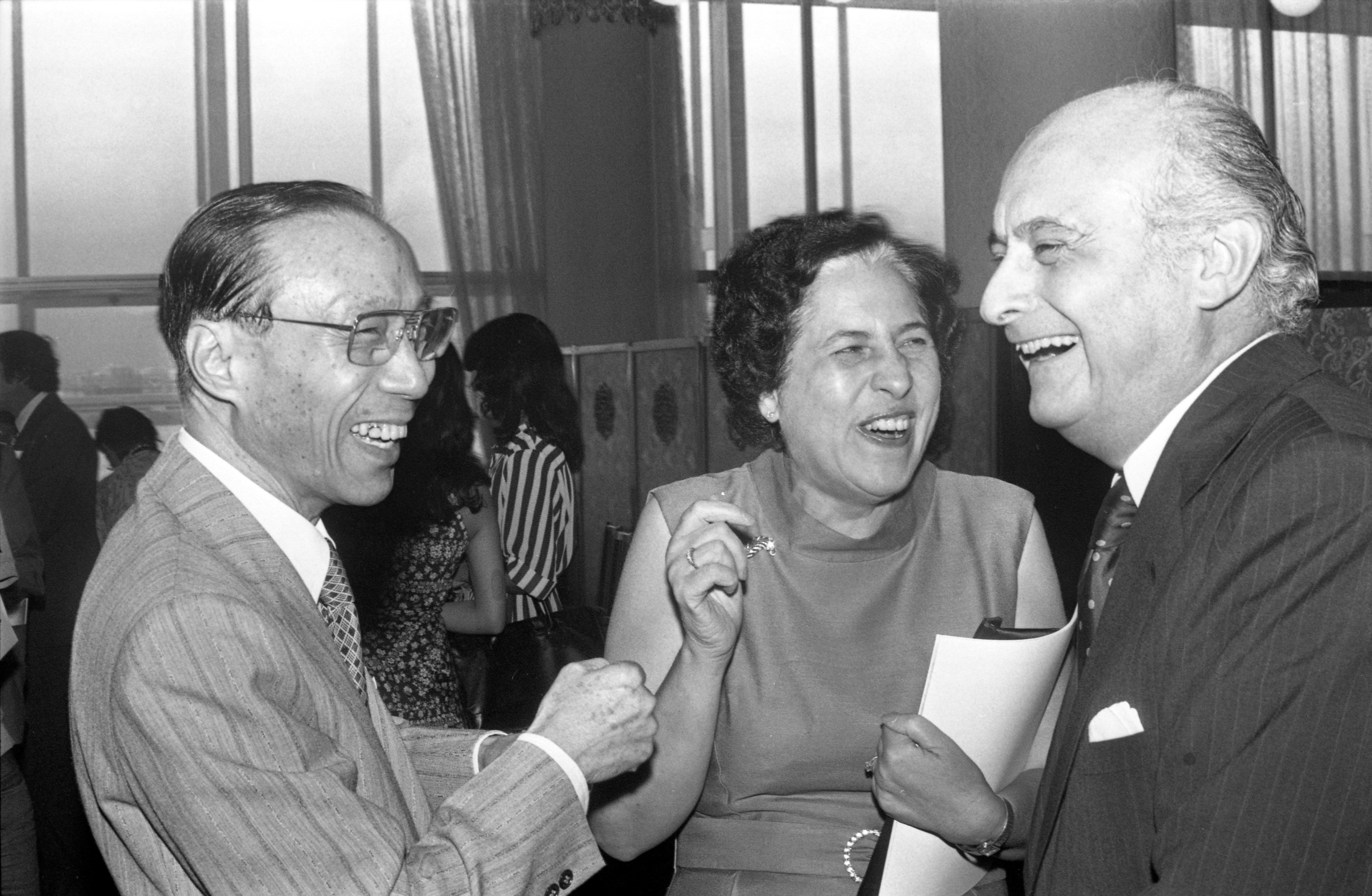 (From right) Arnaldo de Oliveira Sales, Chairman of the Urban Council; Mrs Sales; and Sir Run Run Shaw of the Shaw Brothers sharing a joke at the opening of the first Hong Kong International Film Festival on June 27, 1977. Photo: C.Y Yu