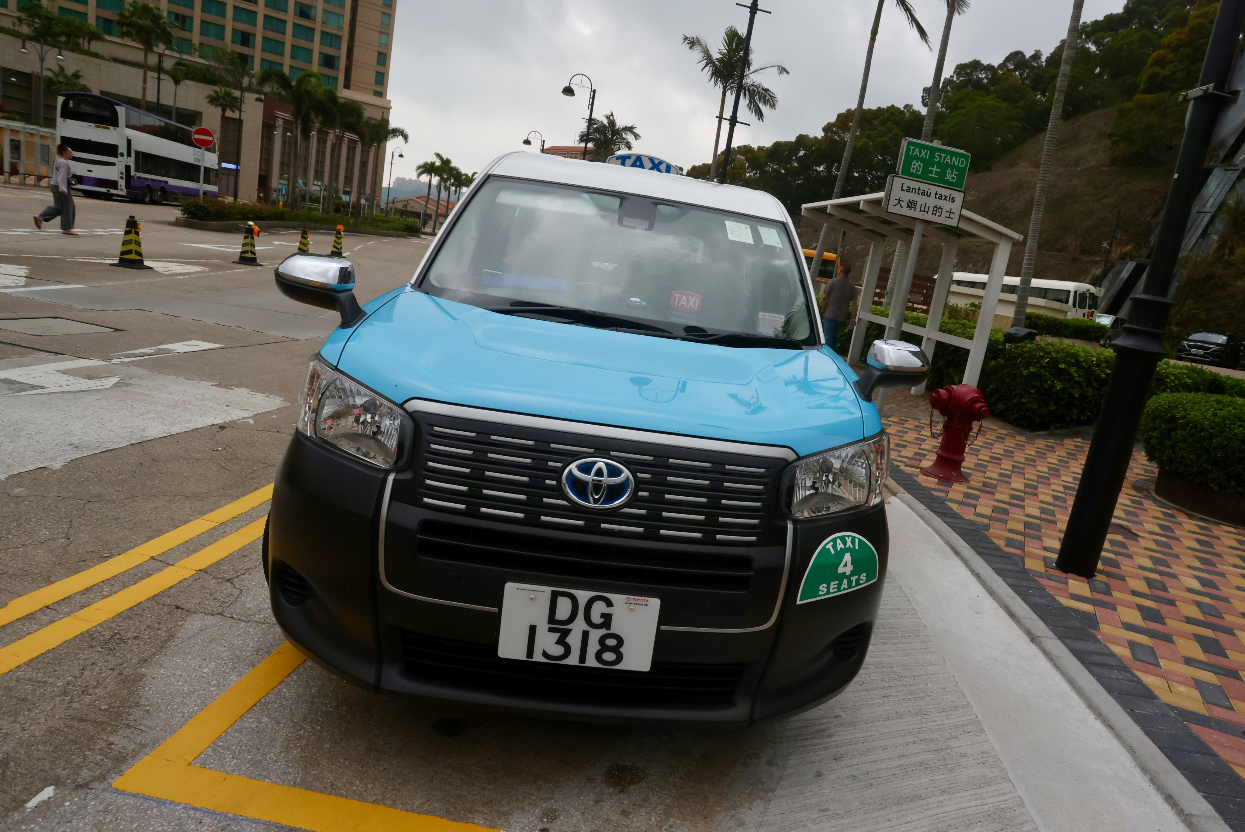 A Lantau taxi waiting at the Discovery Bay North Plaza taxi stand on Lantau Island. Currently, taxis are only allowed to go as far as this plaza. Photo: Jonathan Wong