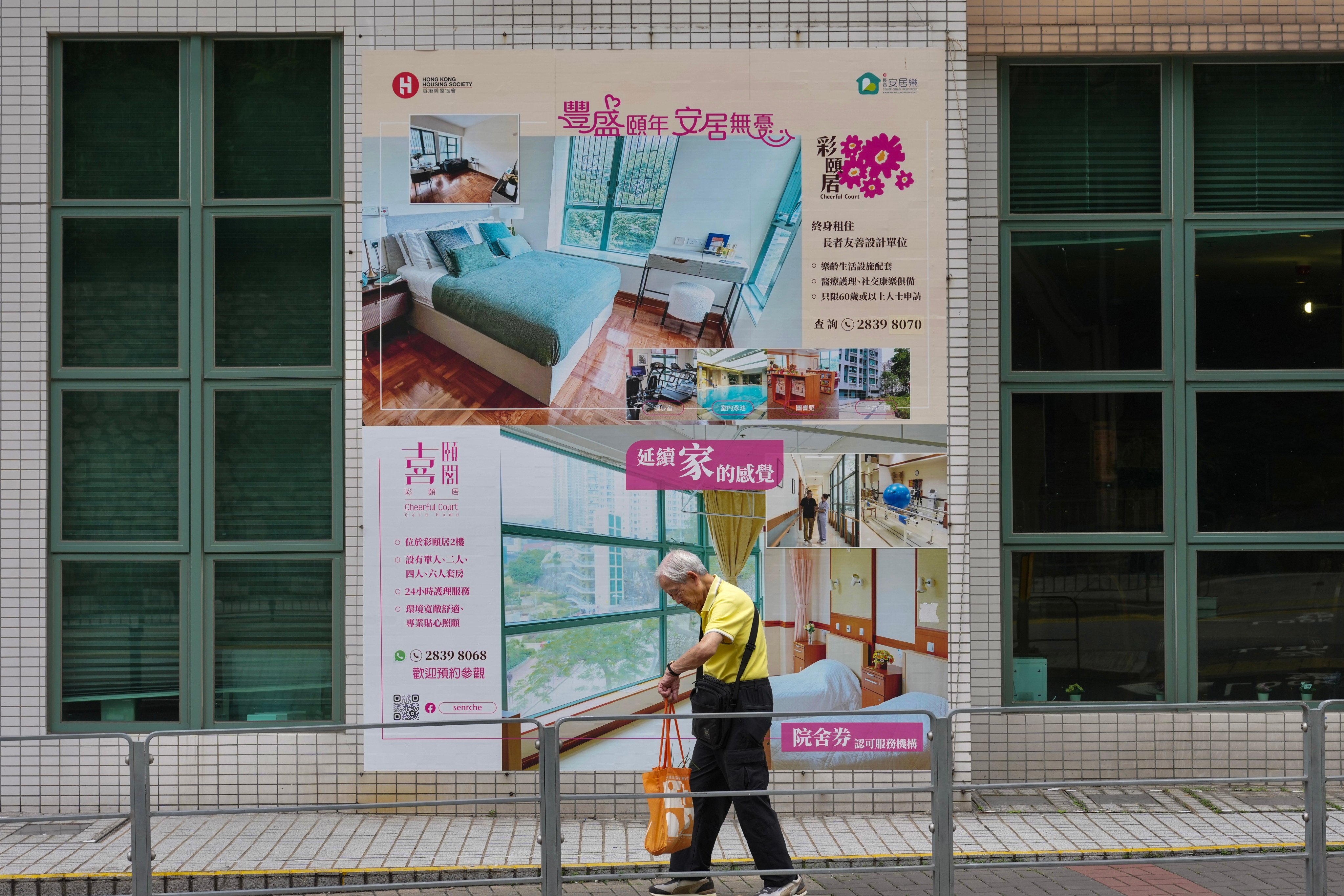 An elderly man walks along a street in Kowloon Bay on May 11. Photo: Karma Lo