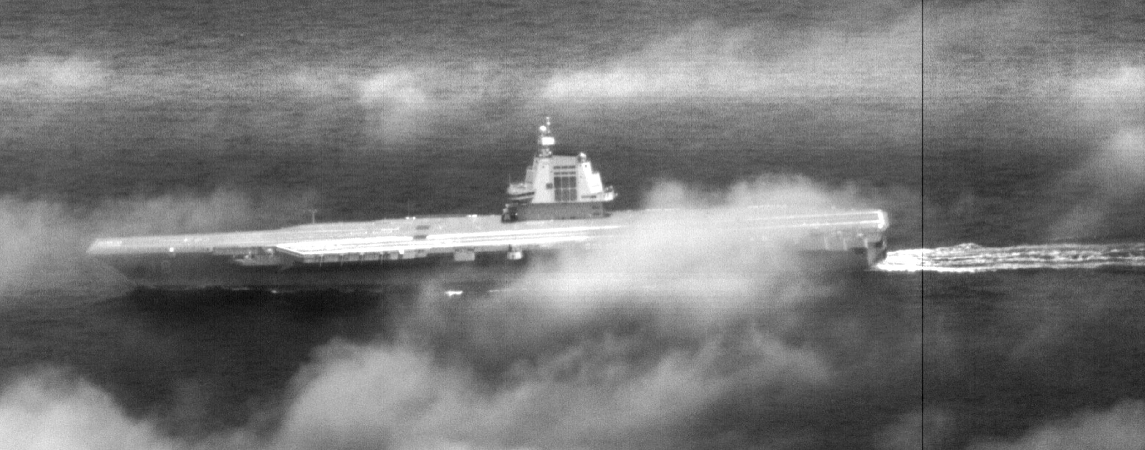 A surveillance photo released by the Taiwanese defence ministry shows the Fujian, the People's Liberation Army's newest and most advanced aircraft carrier, as it transits the Taiwan Strait on Tuesday. Photo: Kyodo
