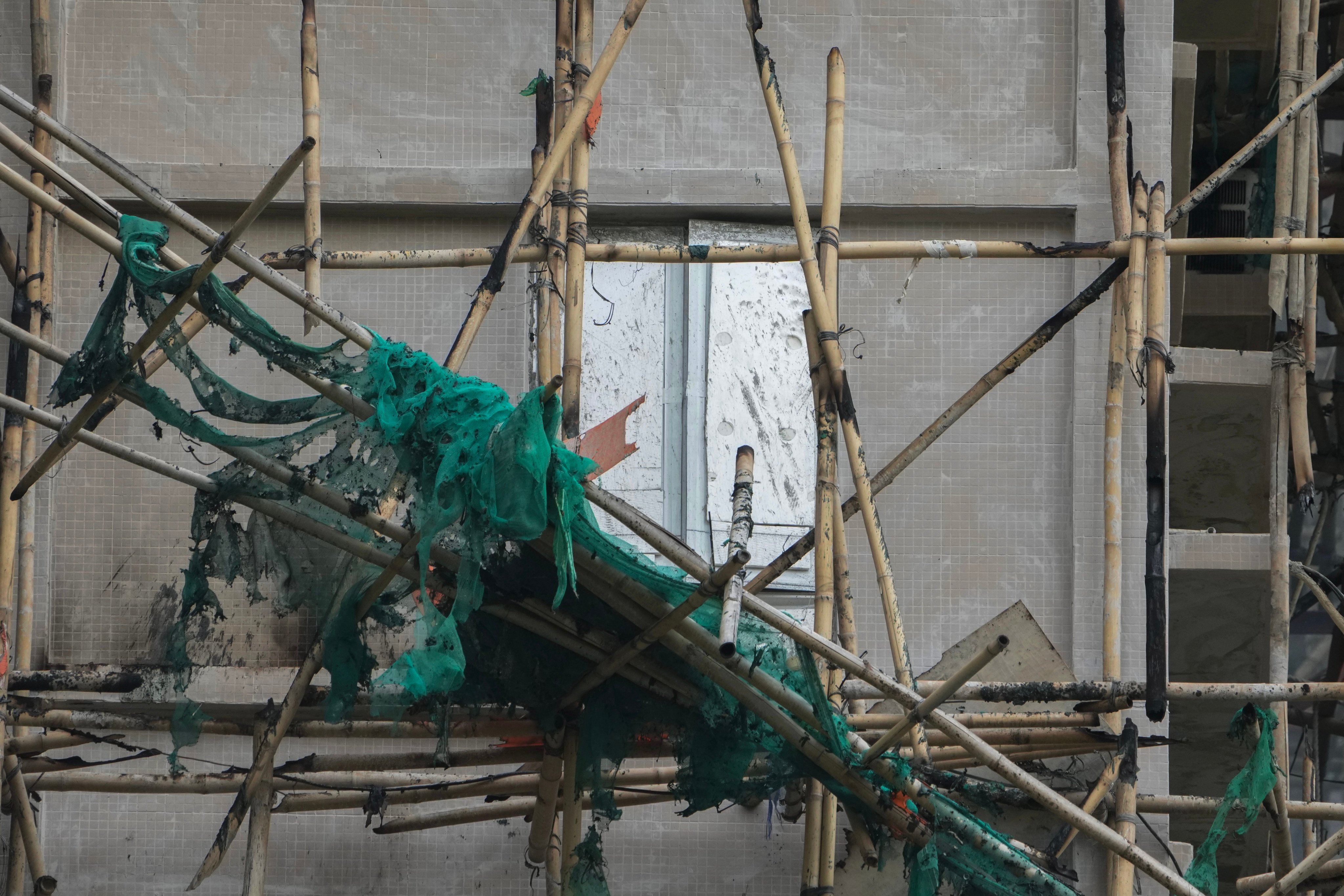 Fire-damaged scaffolding at the estate. Photo: Karma Lo