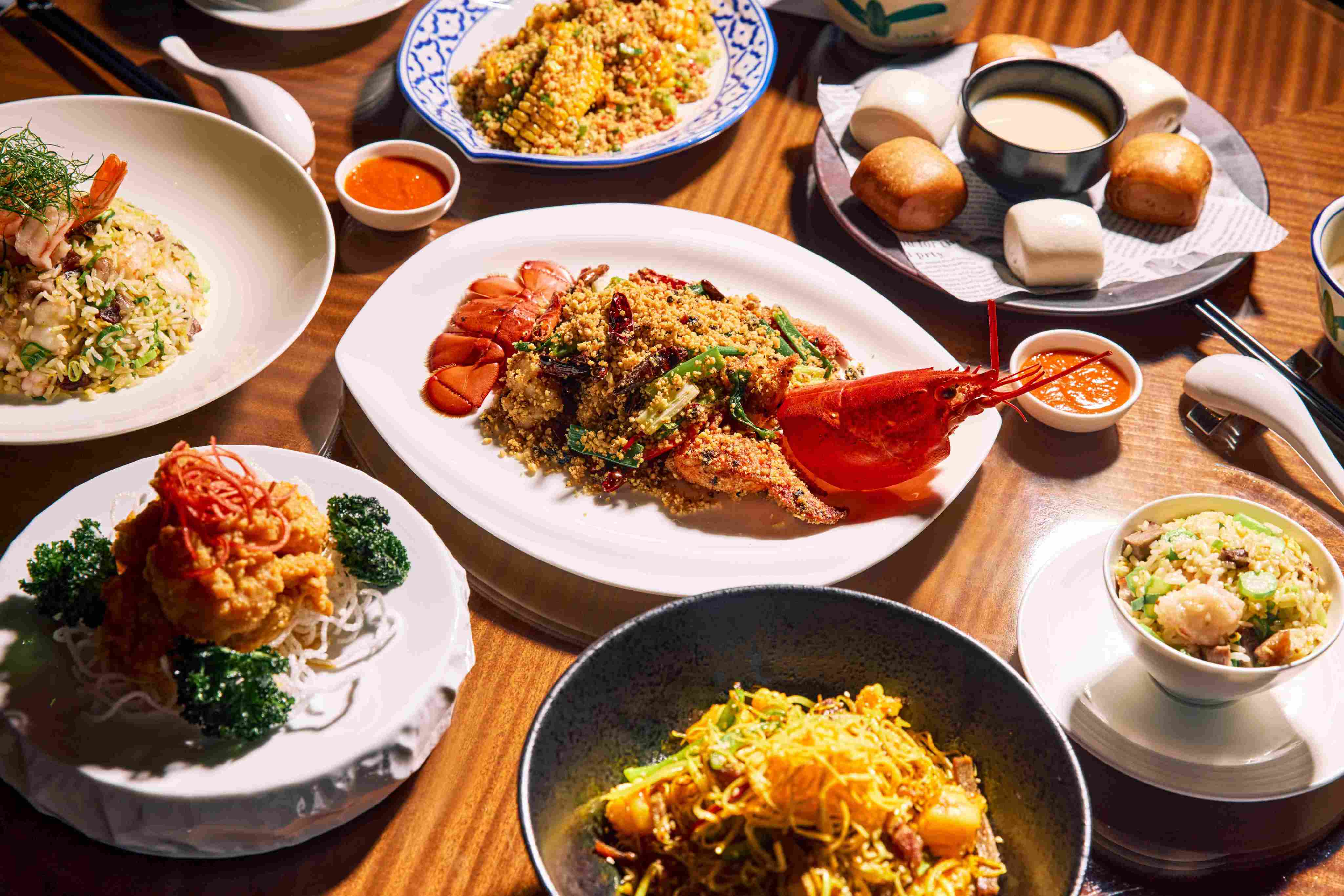Typhoon Shelter Wok‑Fried Lobster (centre) and other dishes on the Hong Kong Sizzle menu at The Lounge. Photo: Four Seasons Hong Kong