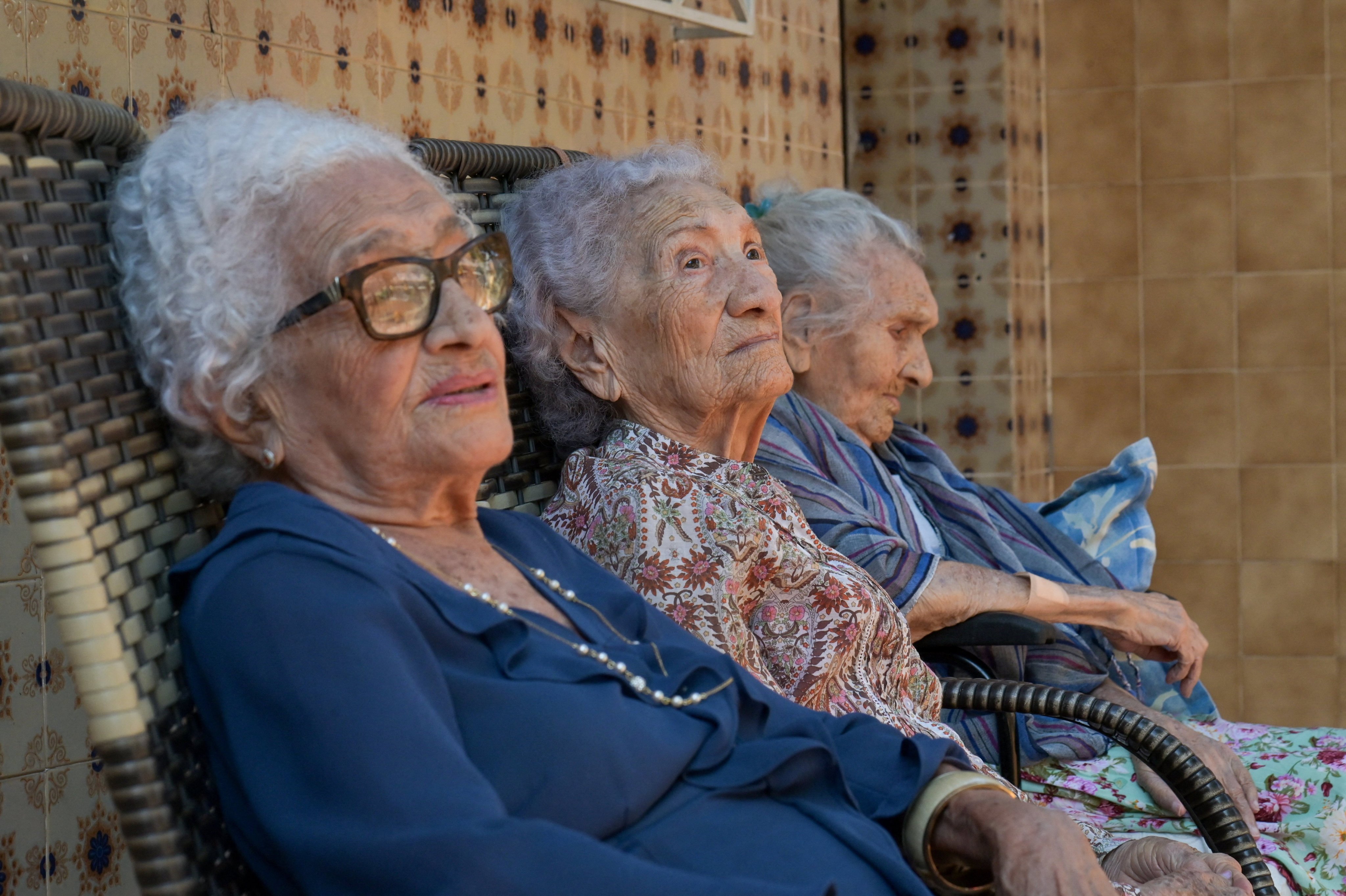 (From left) Zoraide de Deus Mota, Zulina de Deus Nunes and Levita de Deus Nunes, recognised as the world’s oldest living trio of sisters, are interviewed in Rio de Janeiro, Brazil, on Tuesday. Photo: Reuters