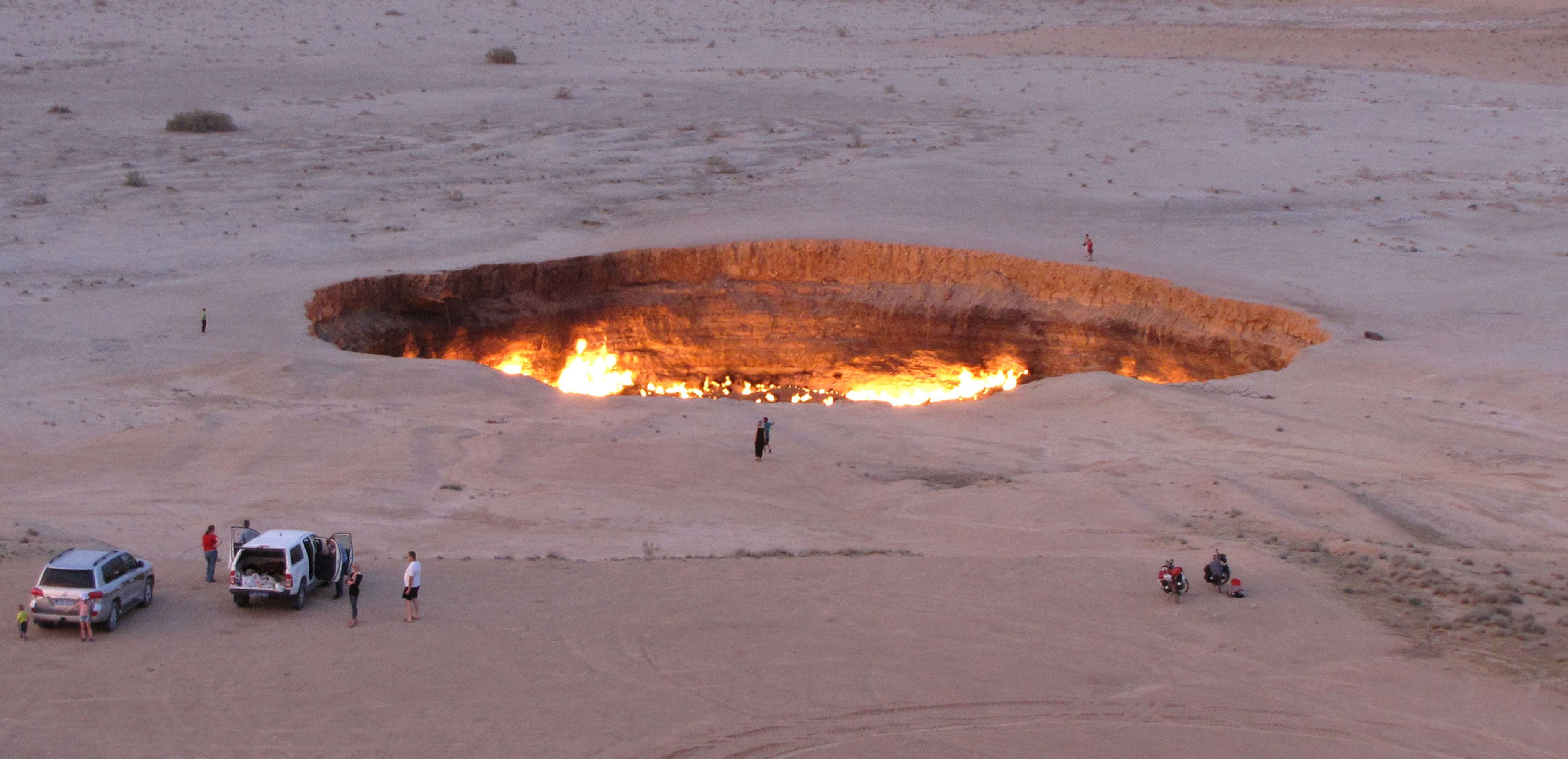 People visiting the “Gateway to Hell”, a crater of burning gas in the heart of Turkmenistan’s Karakum Desert. Photo: AFP