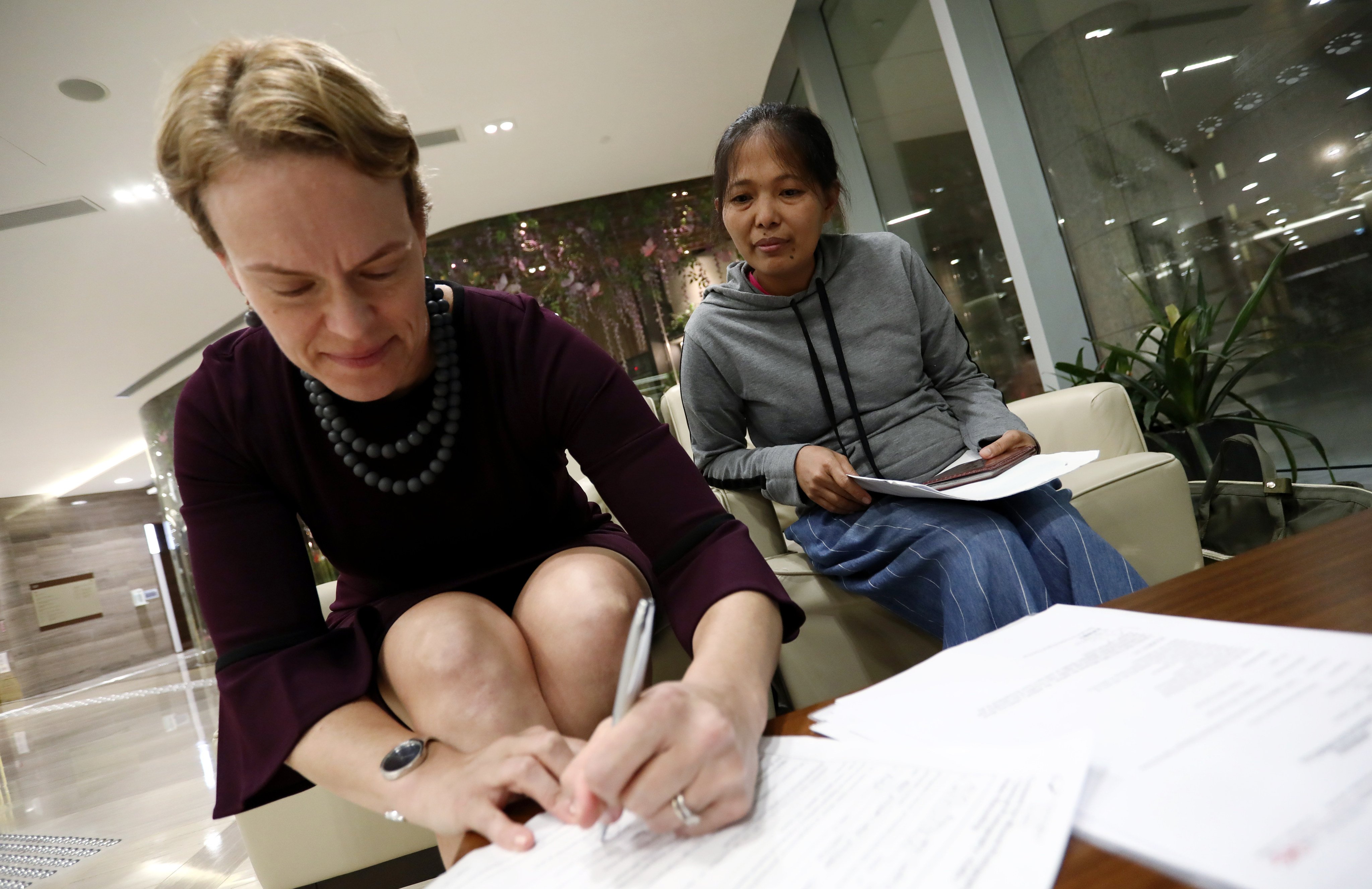Jessica Cutrera accompanies Baby Jane Allas to Gleneagles Hospital. Photo: Jonathan Wong